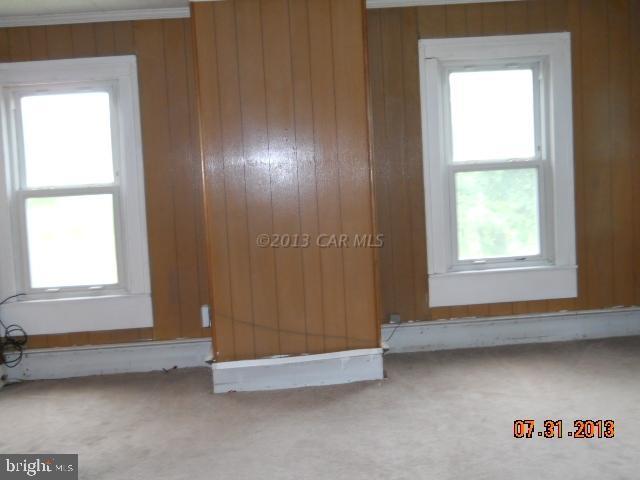 9132 Bethel Road Willards, MD 21874 - Photo 8 of 18 a view of an empty room with a window