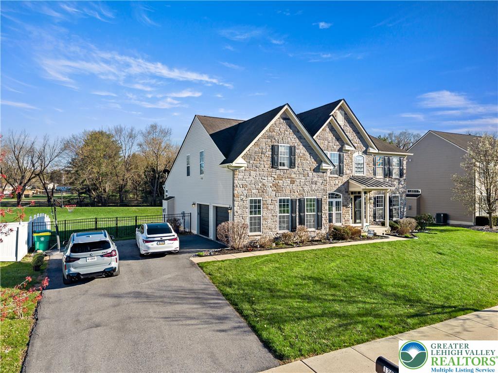 130 Lower Way Road Easton, PA 18045 - Photo 4 of 56 a front view of a house with garden