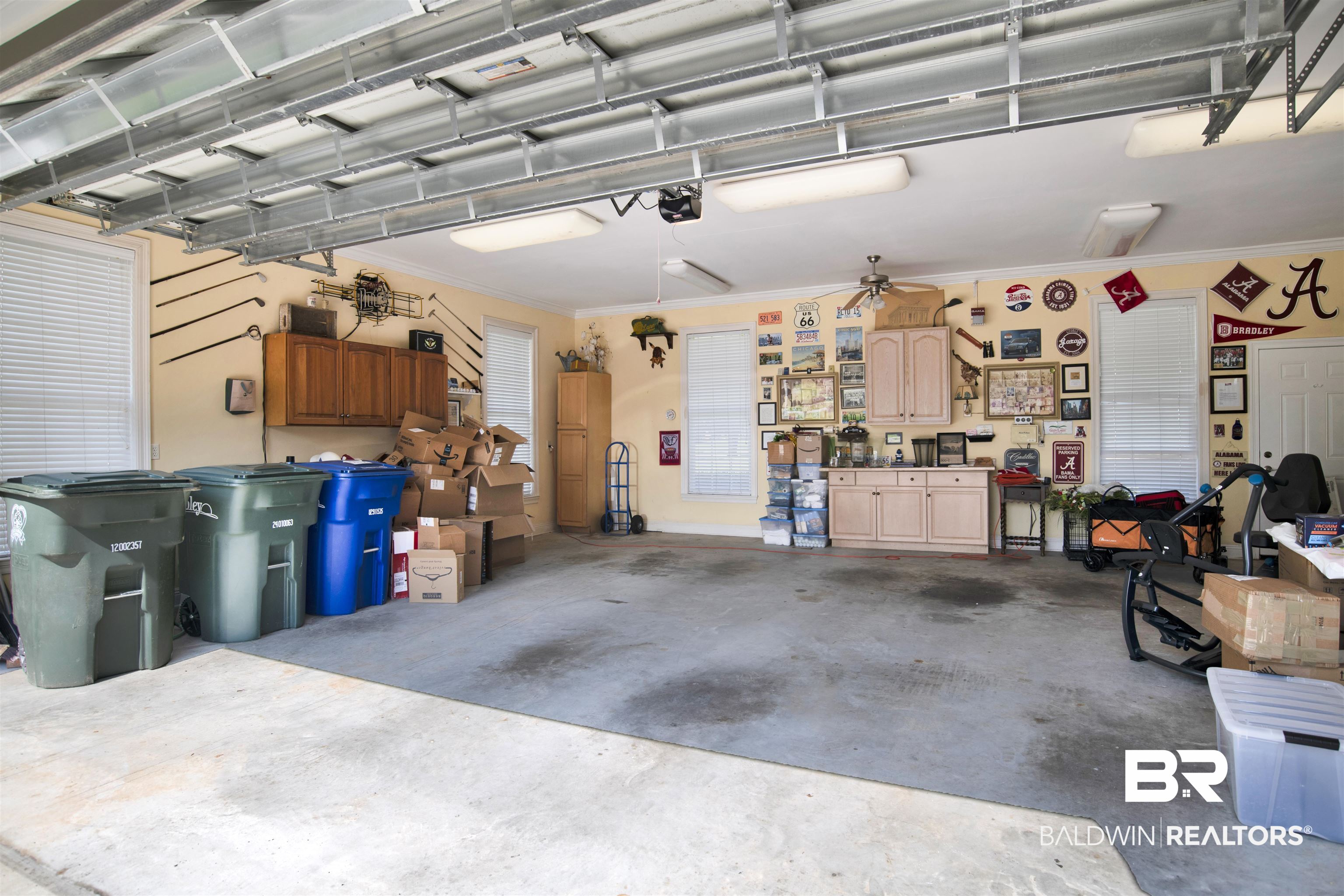 23014 Carnoustie Drive Foley, AL 36535 - Photo 29 of 49 Garage featuring a workshop area