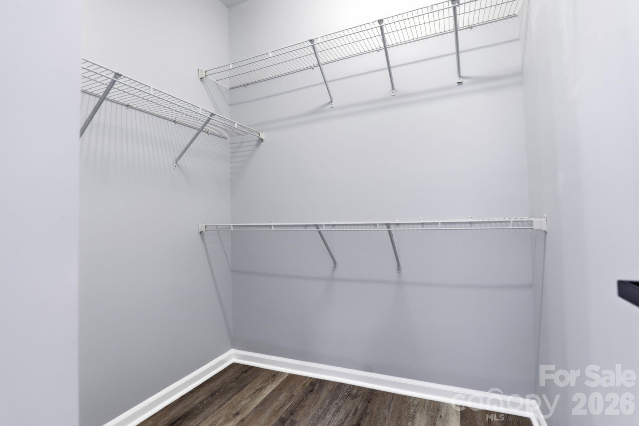 7978 Mariners Pointe Circle Denver, NC 28037 - Photo 17 of 37 a view of a room with racks on the wall