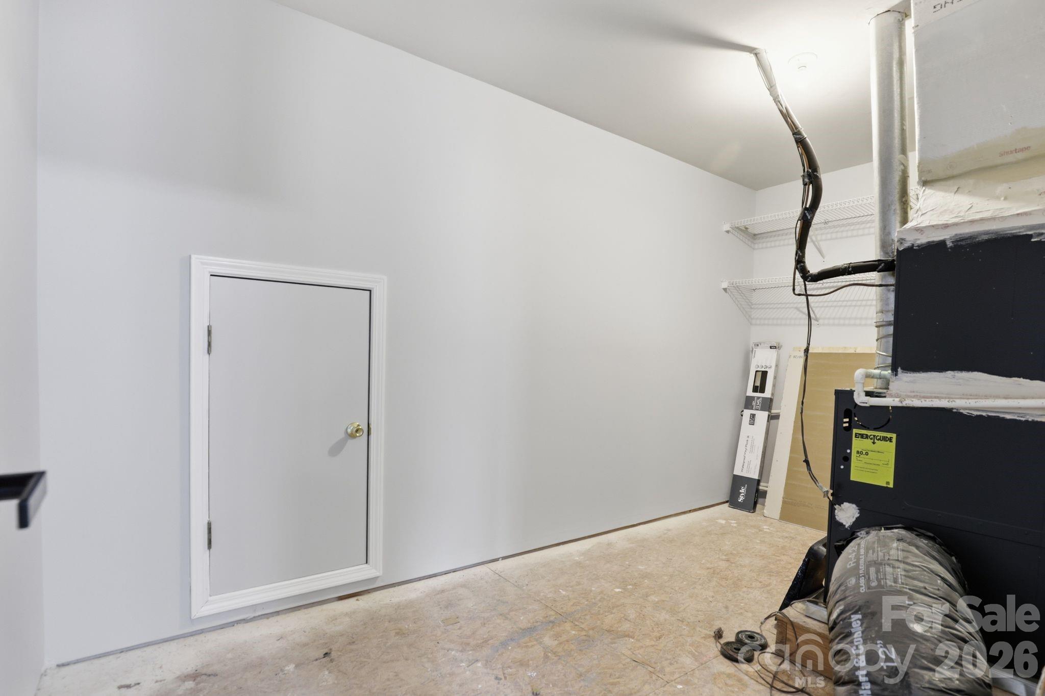 7978 Mariners Pointe Circle Denver, NC 28037 - Photo 27 of 37 a room with storage and utility