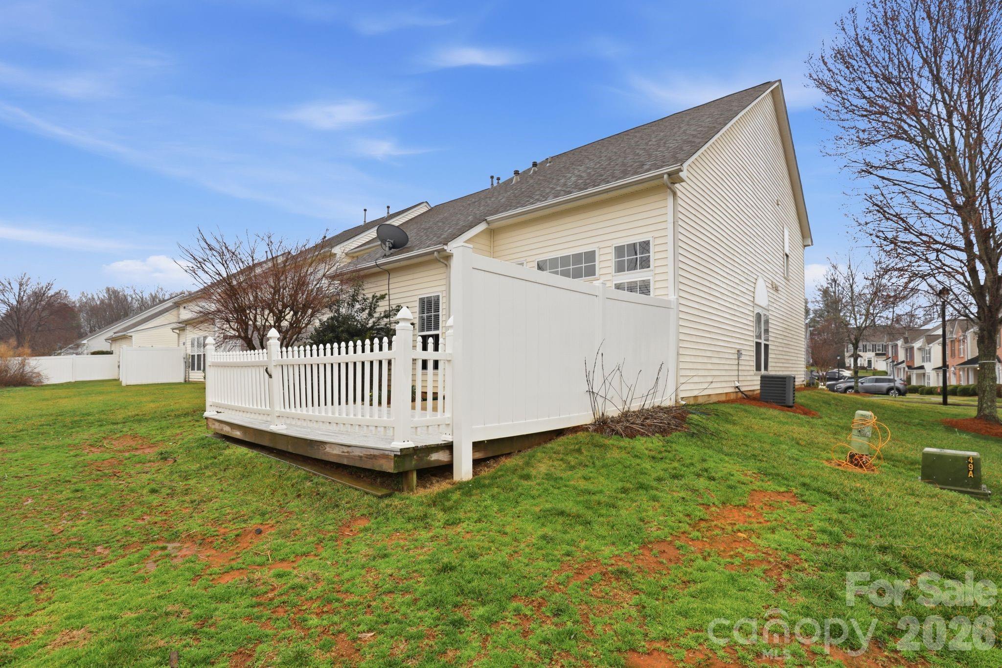 7978 Mariners Pointe Circle Denver, NC 28037 - Photo 34 of 37 a view of a house with a yard