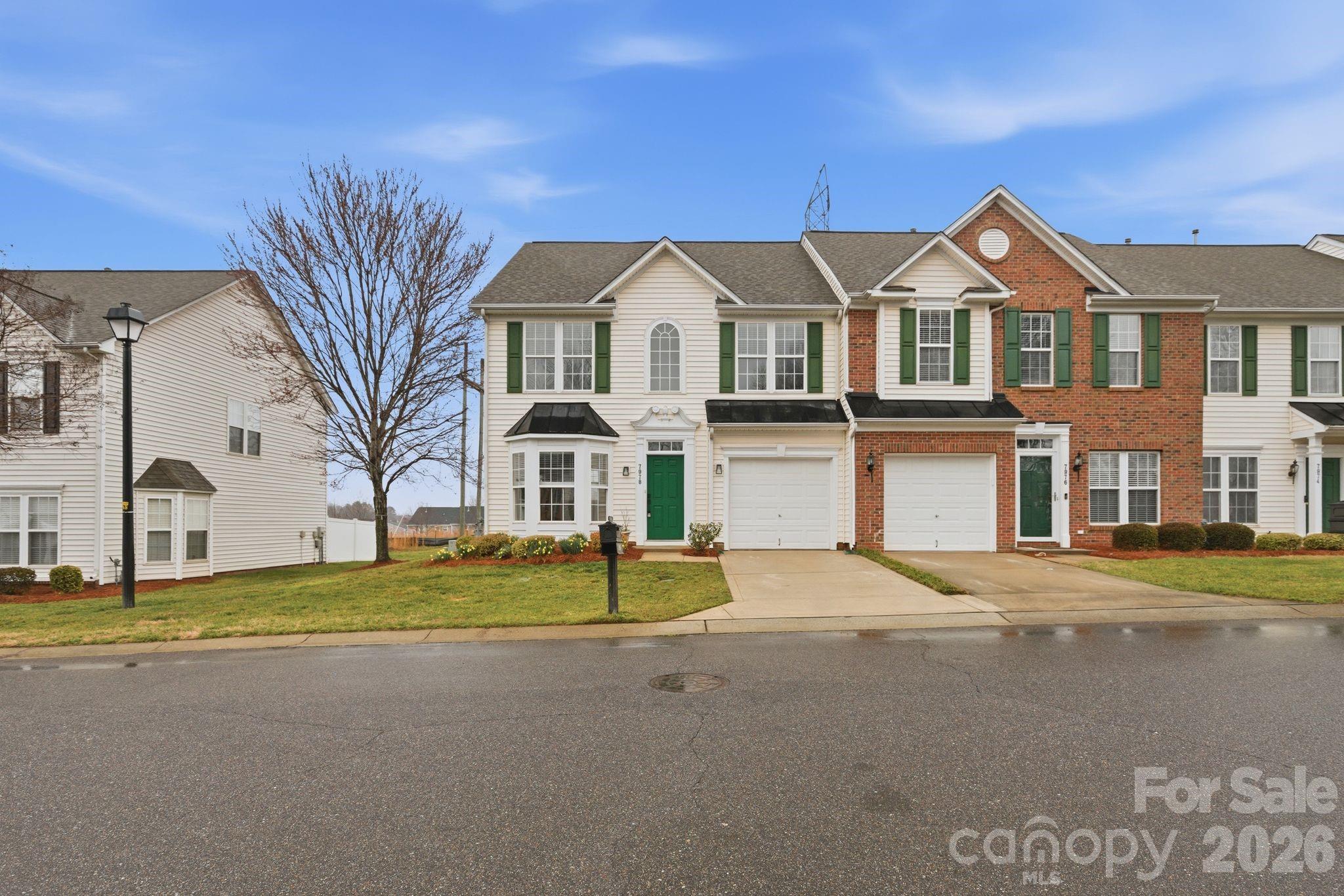 7978 Mariners Pointe Circle Denver, NC 28037 - Photo 37 of 37 a view of multiple houses with yard and road