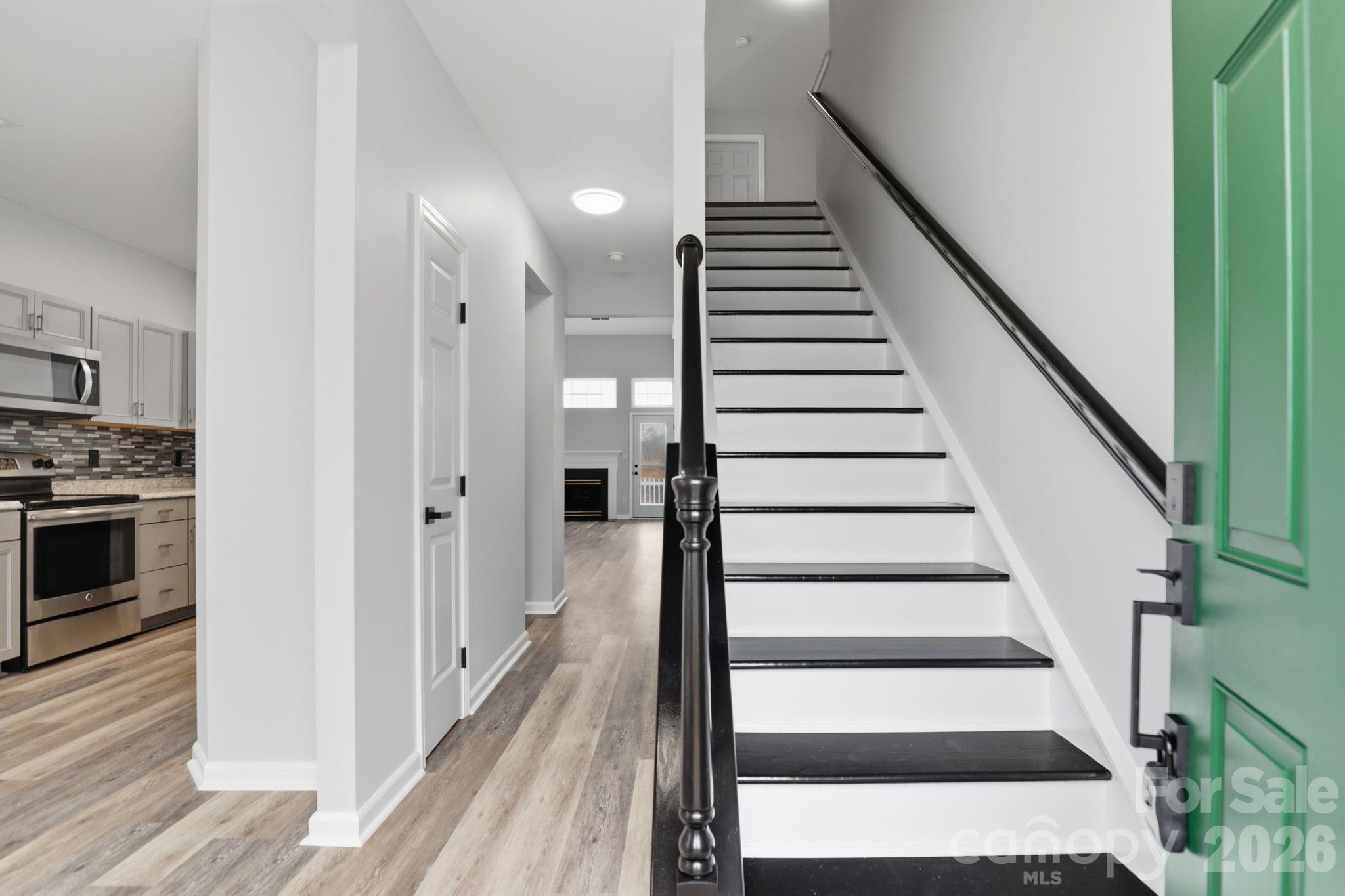7978 Mariners Pointe Circle Denver, NC 28037 - Photo 5 of 37 a view of entryway and hall with wooden floor