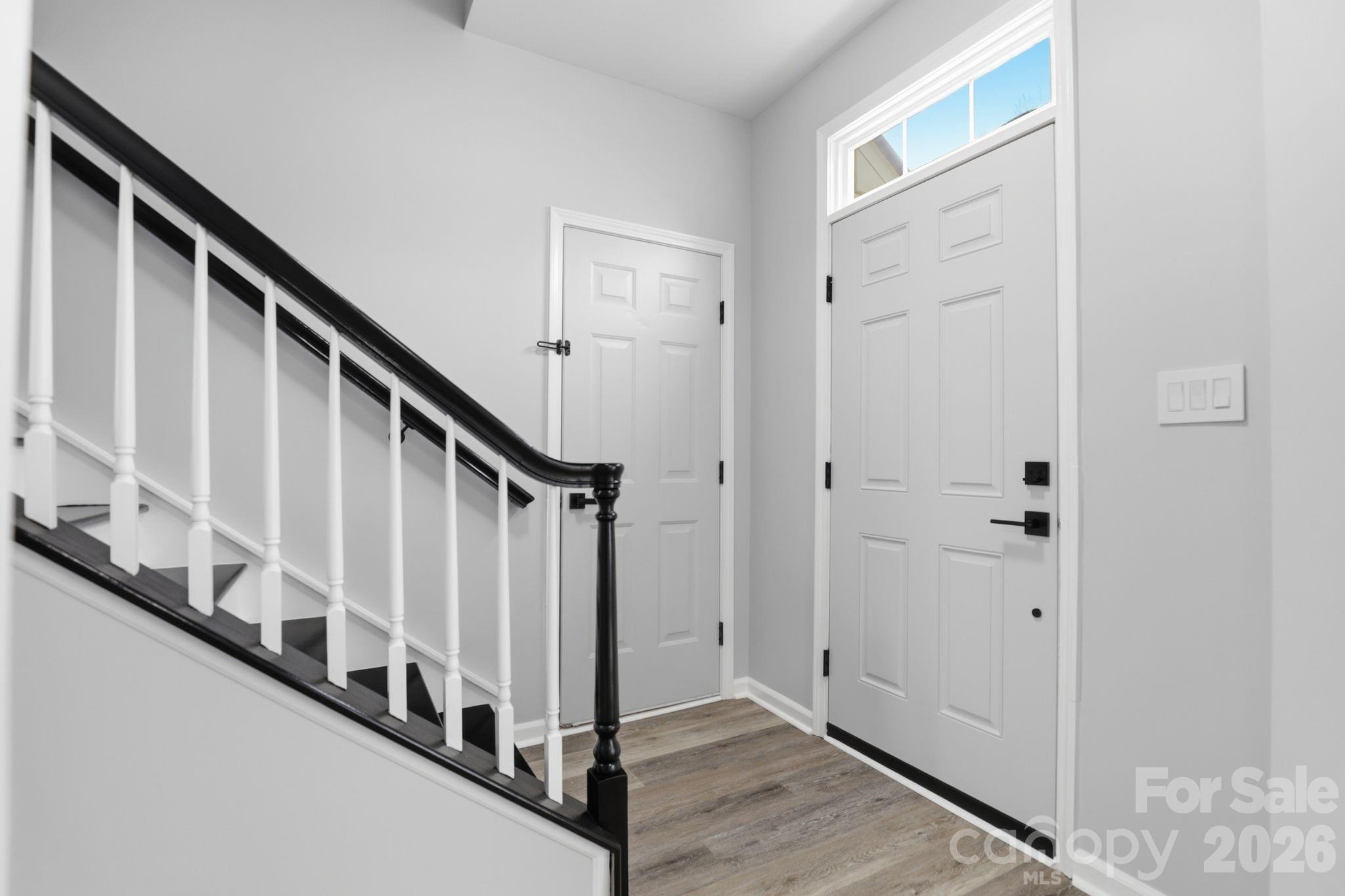 7978 Mariners Pointe Circle Denver, NC 28037 - Photo 6 of 37 a view of a hallway with staircase