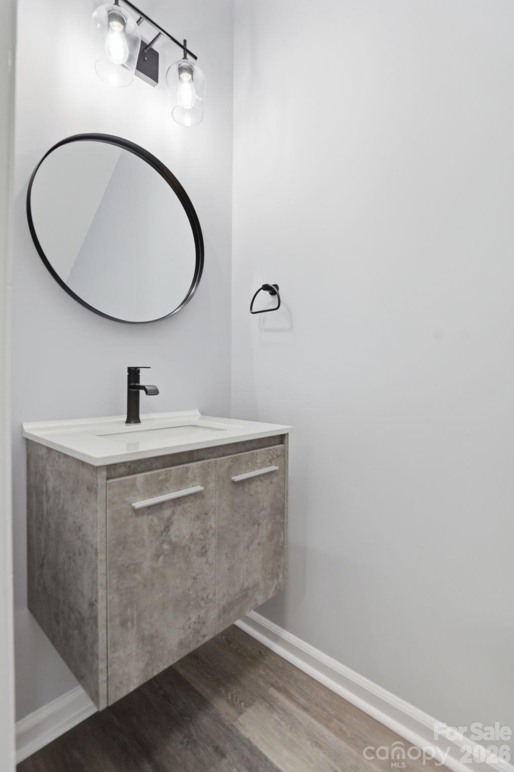 7978 Mariners Pointe Circle Denver, NC 28037 - Photo 9 of 37 a bathroom with a sink mirror and vanity
