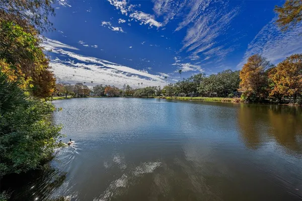a view of a lake with a outdoor space