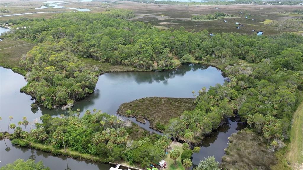 0 Marys Fish Camp Road Spring Hill, FL 34607 - Photo 22 of 24 an aerial view of a house with a yard