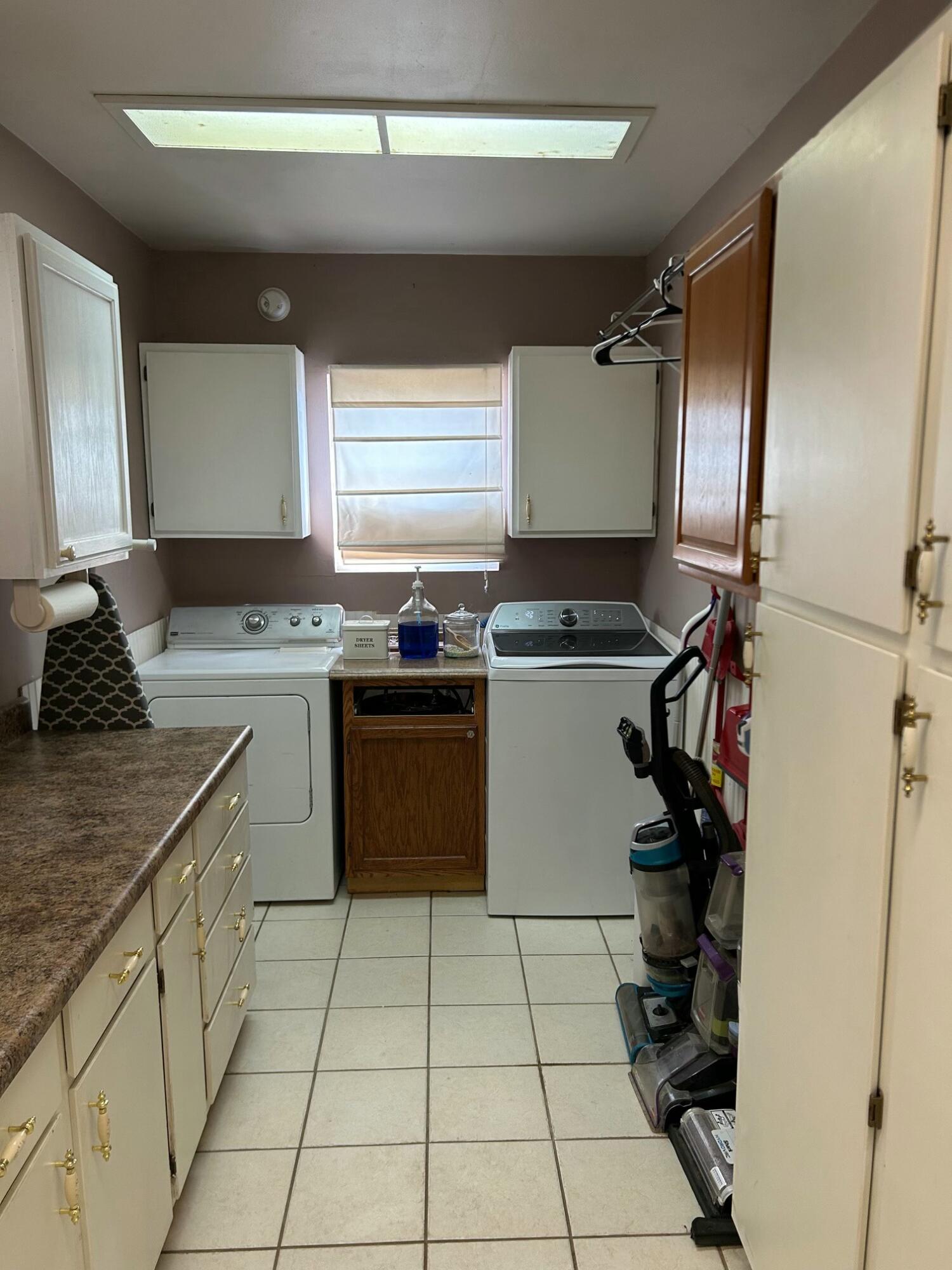 3006 County Road 3500 Lubbock, TX 79403 - Photo 17 of 23 a kitchen with a sink appliances and cabinets
