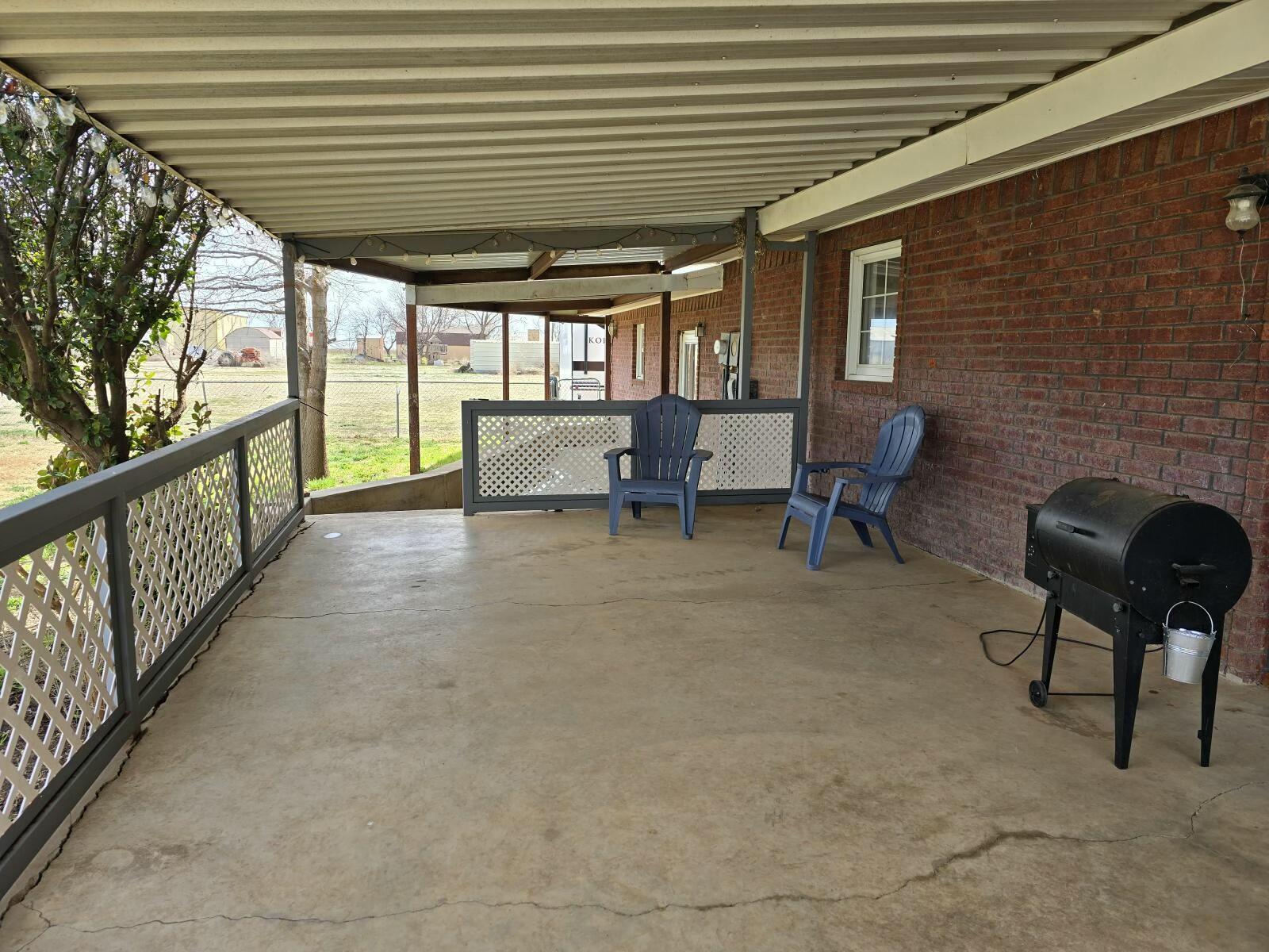 3006 County Road 3500 Lubbock, TX 79403 - Photo 18 of 23 a view of a porch with furniture and next to a yard