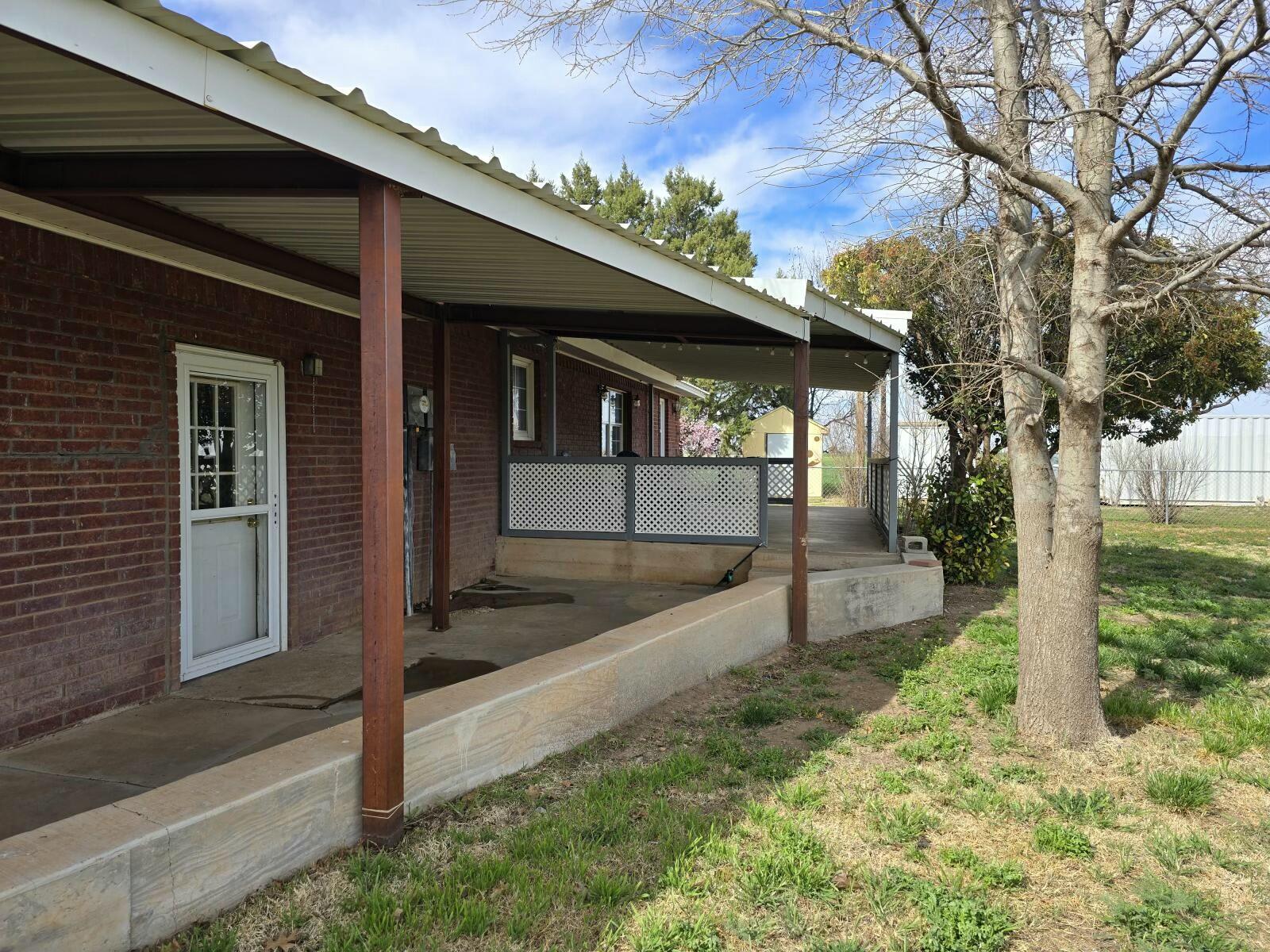 3006 County Road 3500 Lubbock, TX 79403 - Photo 19 of 23 a view of house with backyard