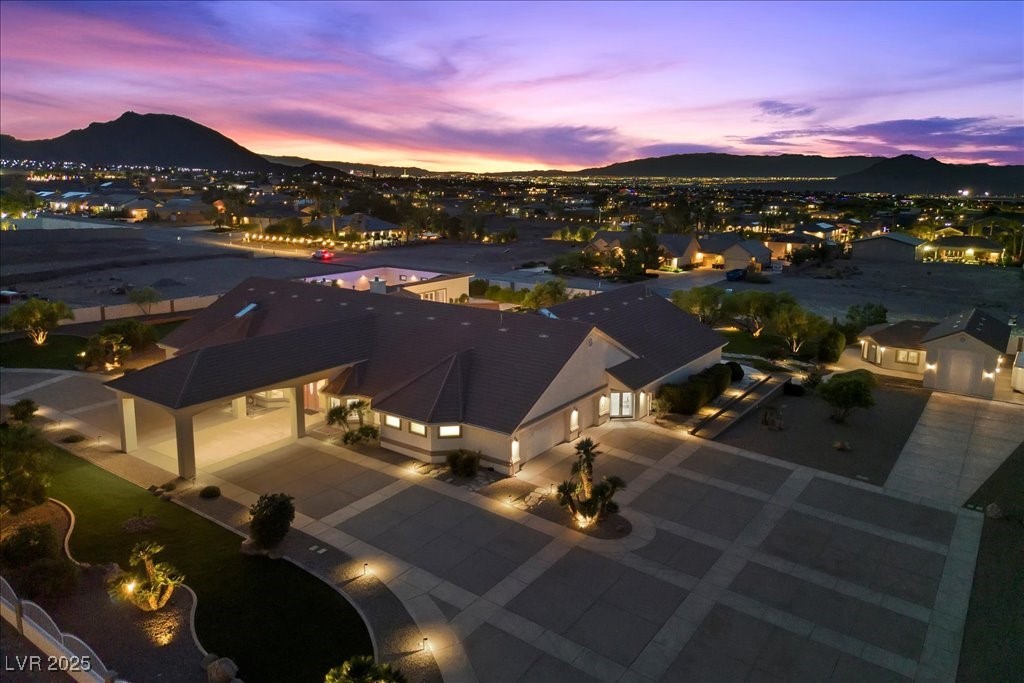 640 Quail Covey Road Henderson, NV 89002 - Photo 75 of 75 View from above of property with mountains at dusk