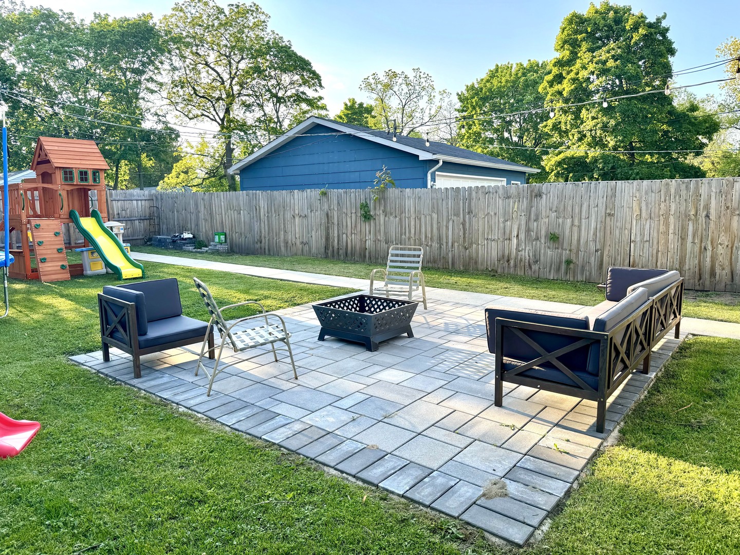 3232 Ezra Avenue Zion, IL 60099 - Photo 2 of 29 a backyard of a house with outdoor seating