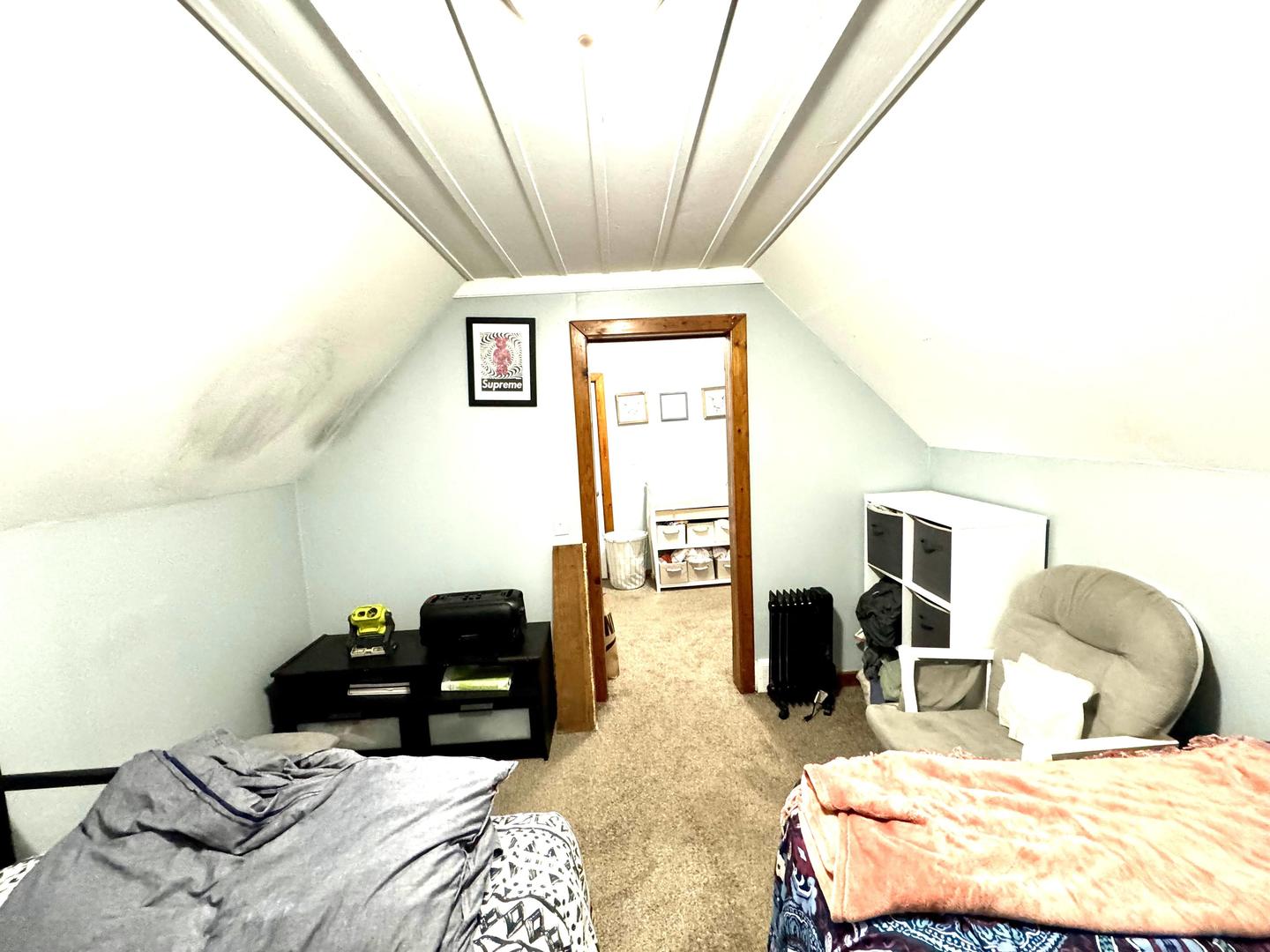 3232 Ezra Avenue Zion, IL 60099 - Photo 22 of 29 a bedroom with a bed and wooden floor