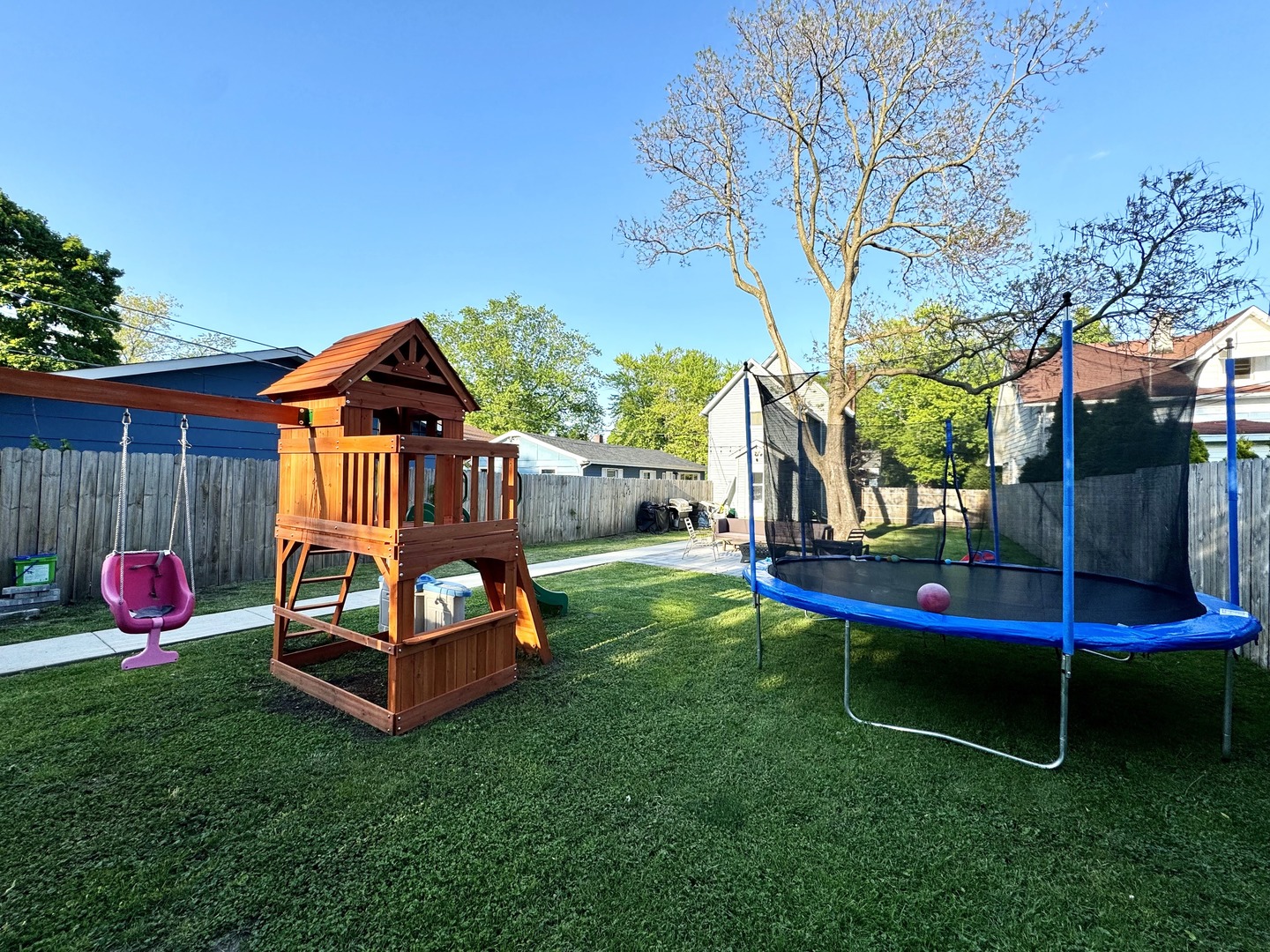 3232 Ezra Avenue Zion, IL 60099 - Photo 3 of 29 a backyard of a house with table and chairs
