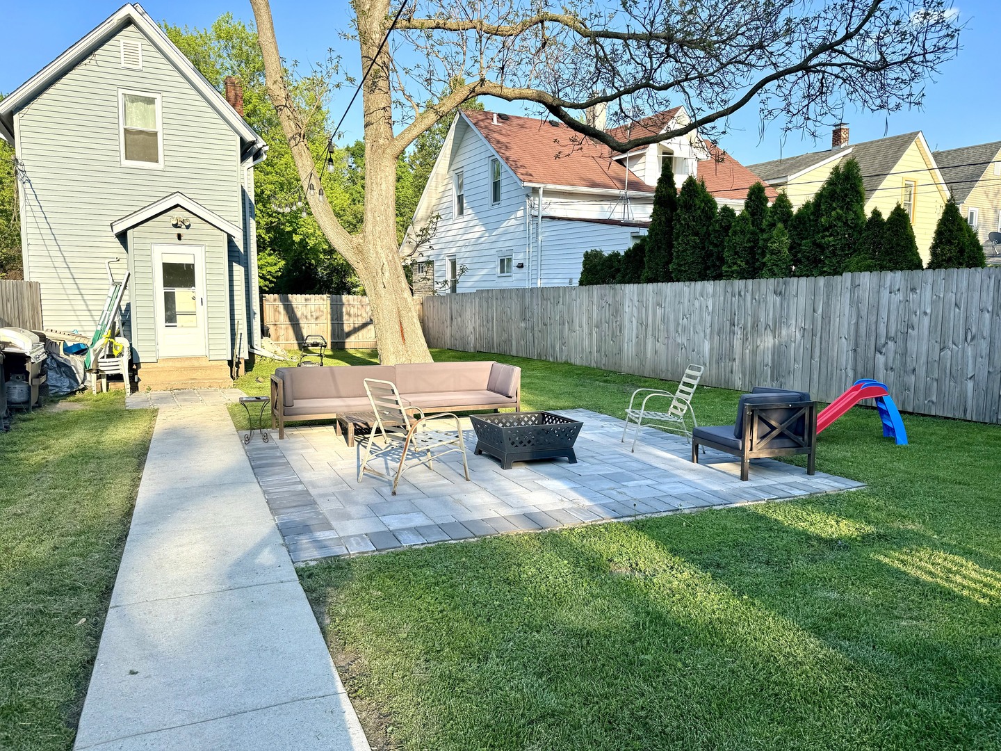 3232 Ezra Avenue Zion, IL 60099 - Photo 5 of 29 a view of backyard with sitting area