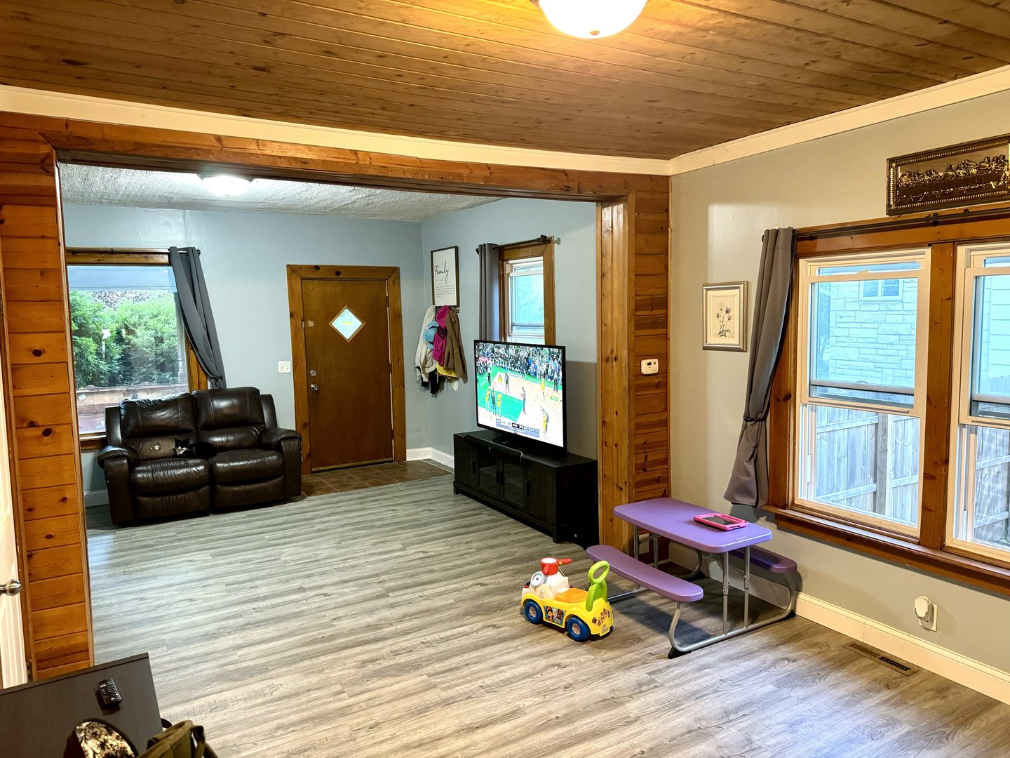 3232 Ezra Avenue Zion, IL 60099 - Photo 6 of 29 a living room with furniture and a fireplace