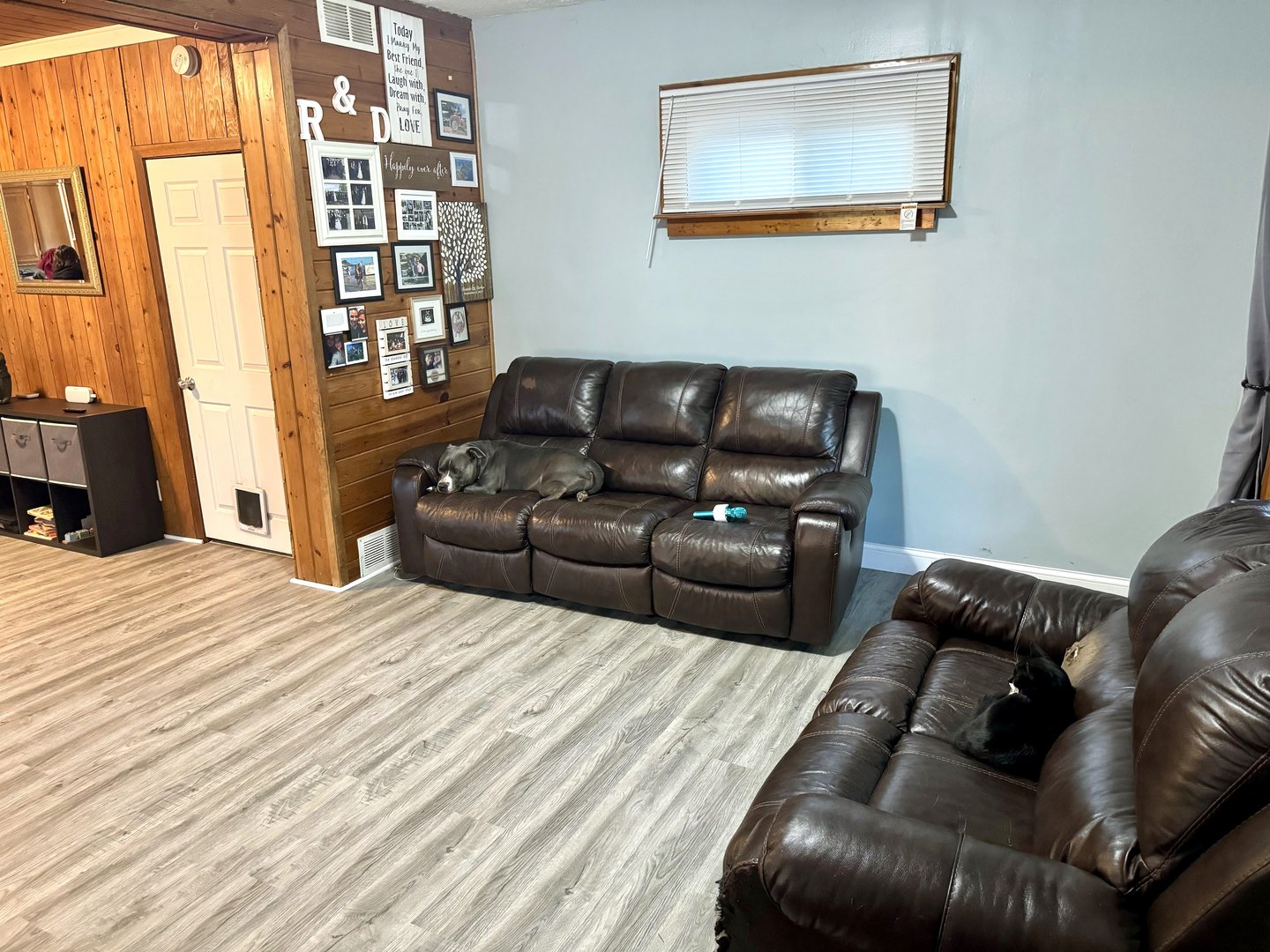 3232 Ezra Avenue Zion, IL 60099 - Photo 10 of 29 a living room with a couch and a window