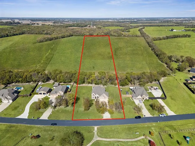 a view of a swimming pool with a lake view