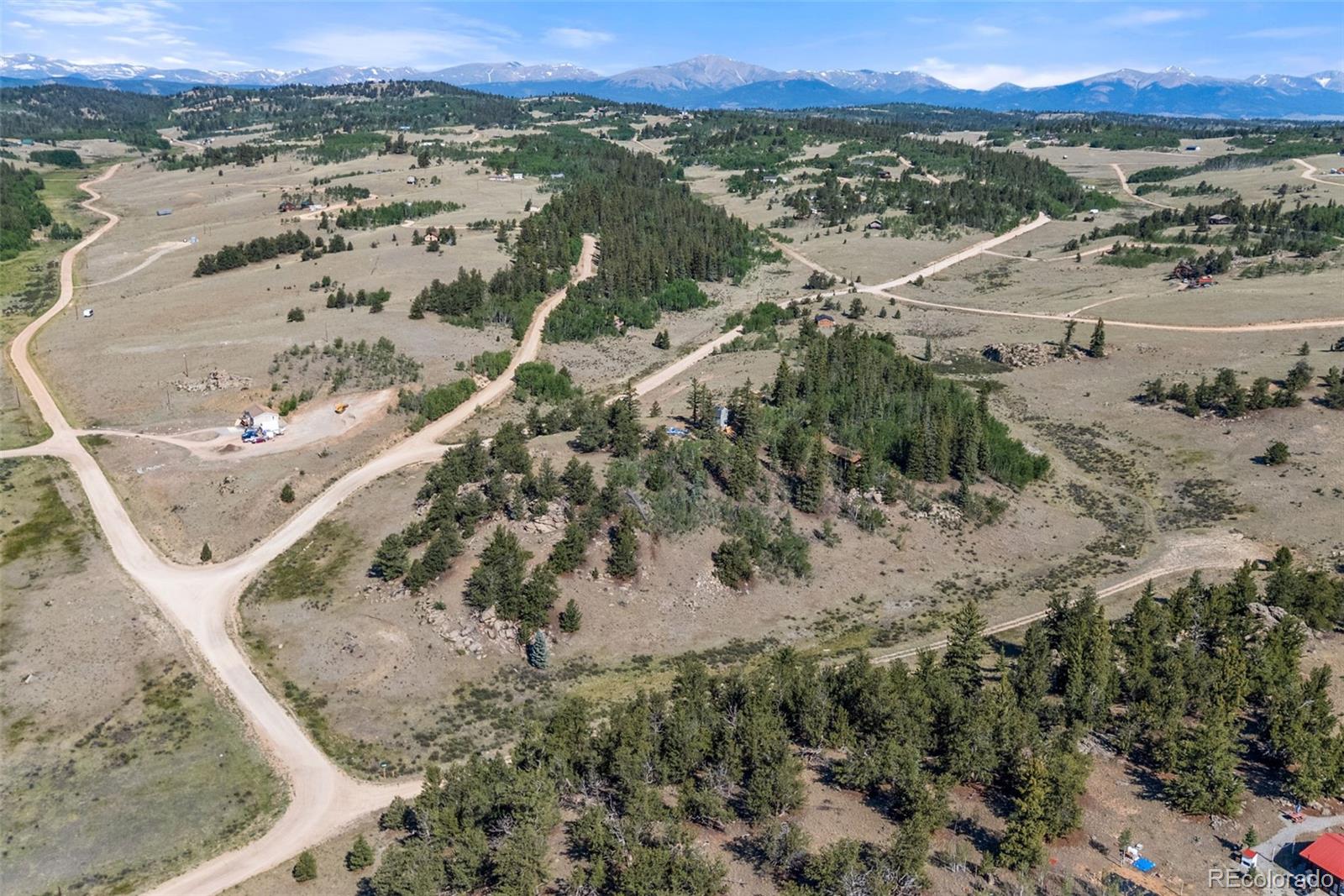 4588 Remington Road Jefferson, CO 80456 - Photo 3 of 11 an aerial view of a house with a yard