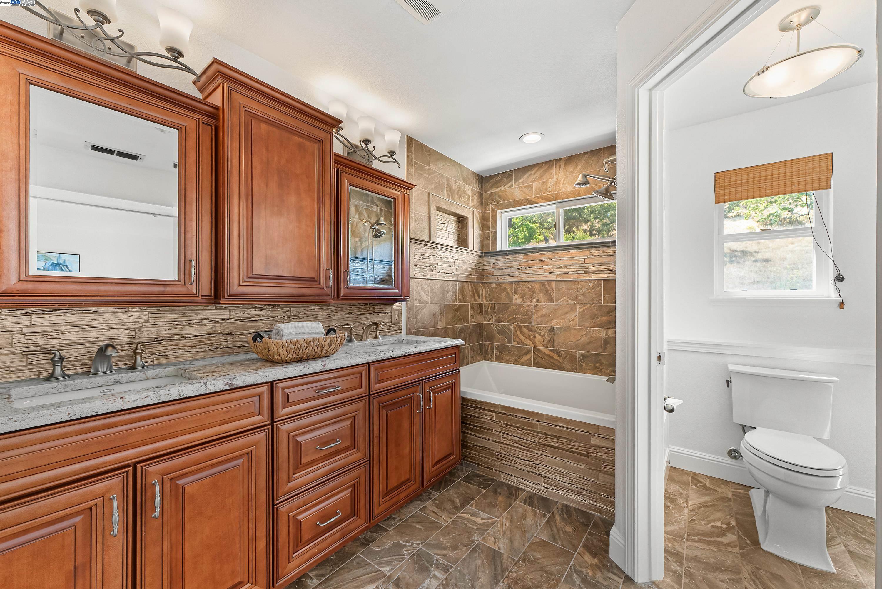 43 Ferdinand Way Novato, CA 94949 - Photo 25 of 43 a bathroom with a granite countertop sink toilet and shower
