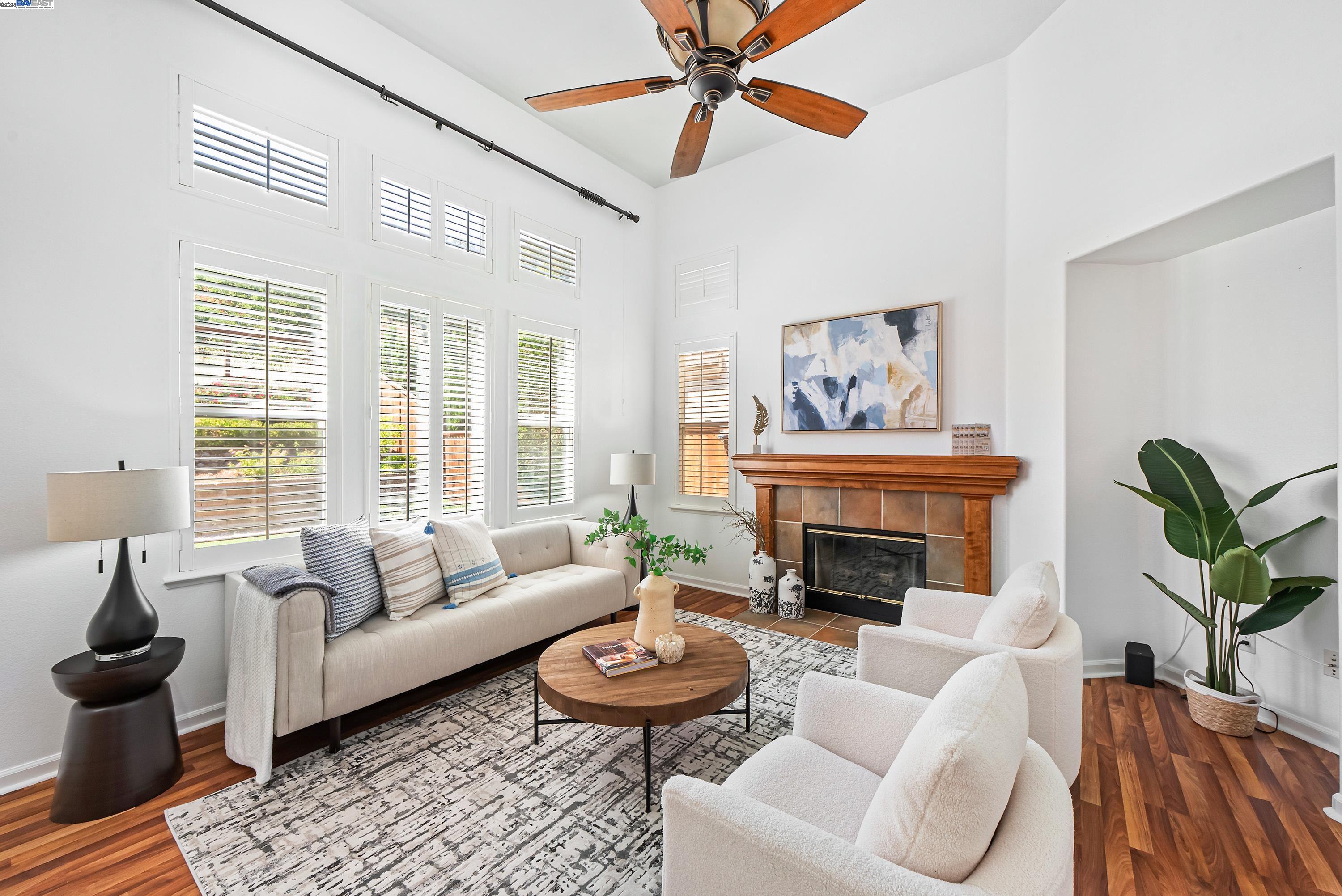 43 Ferdinand Way Novato, CA 94949 - Photo 5 of 43 a living room with furniture a fireplace and a large window