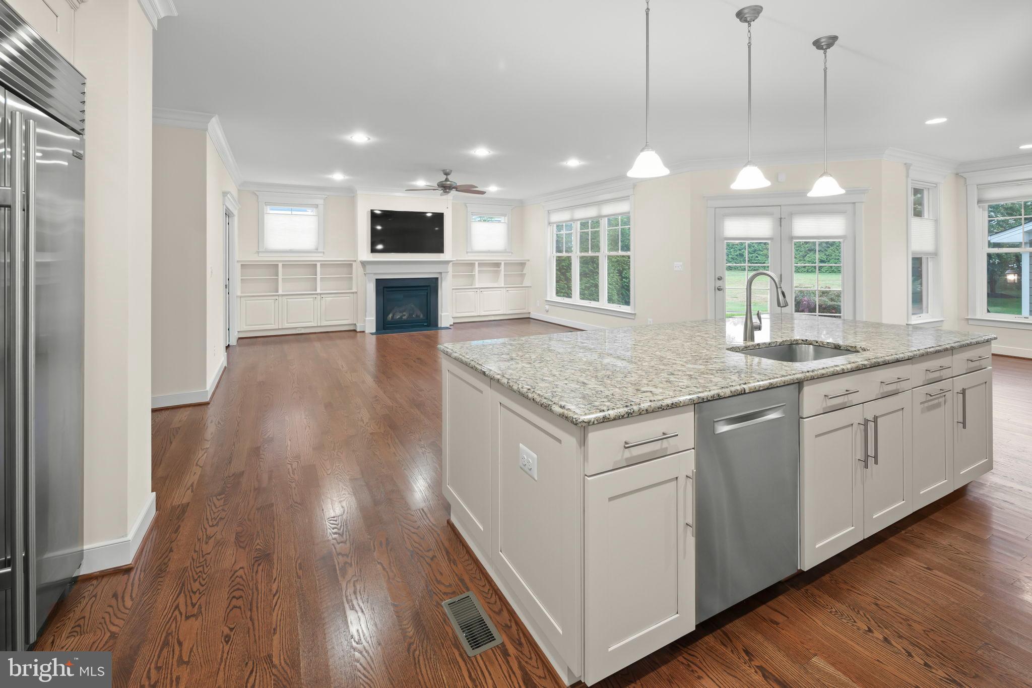 217 Pleasant Street Southwest Vienna, VA 22180 - Photo 19 of 80 Spacious open-concept living area with elegance.
