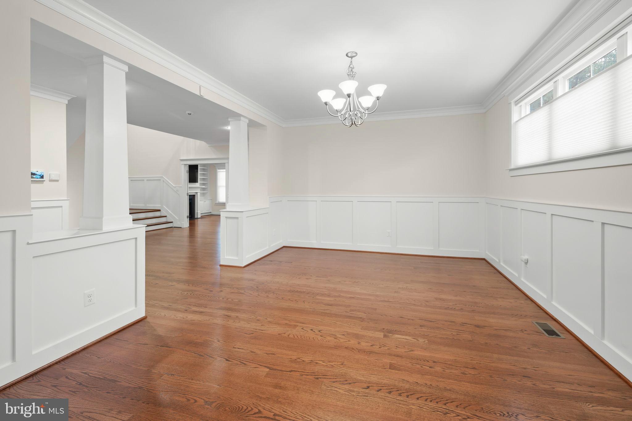 217 Pleasant Street Southwest Vienna, VA 22180 - Photo 25 of 80 wooden floor in an empty room with a window