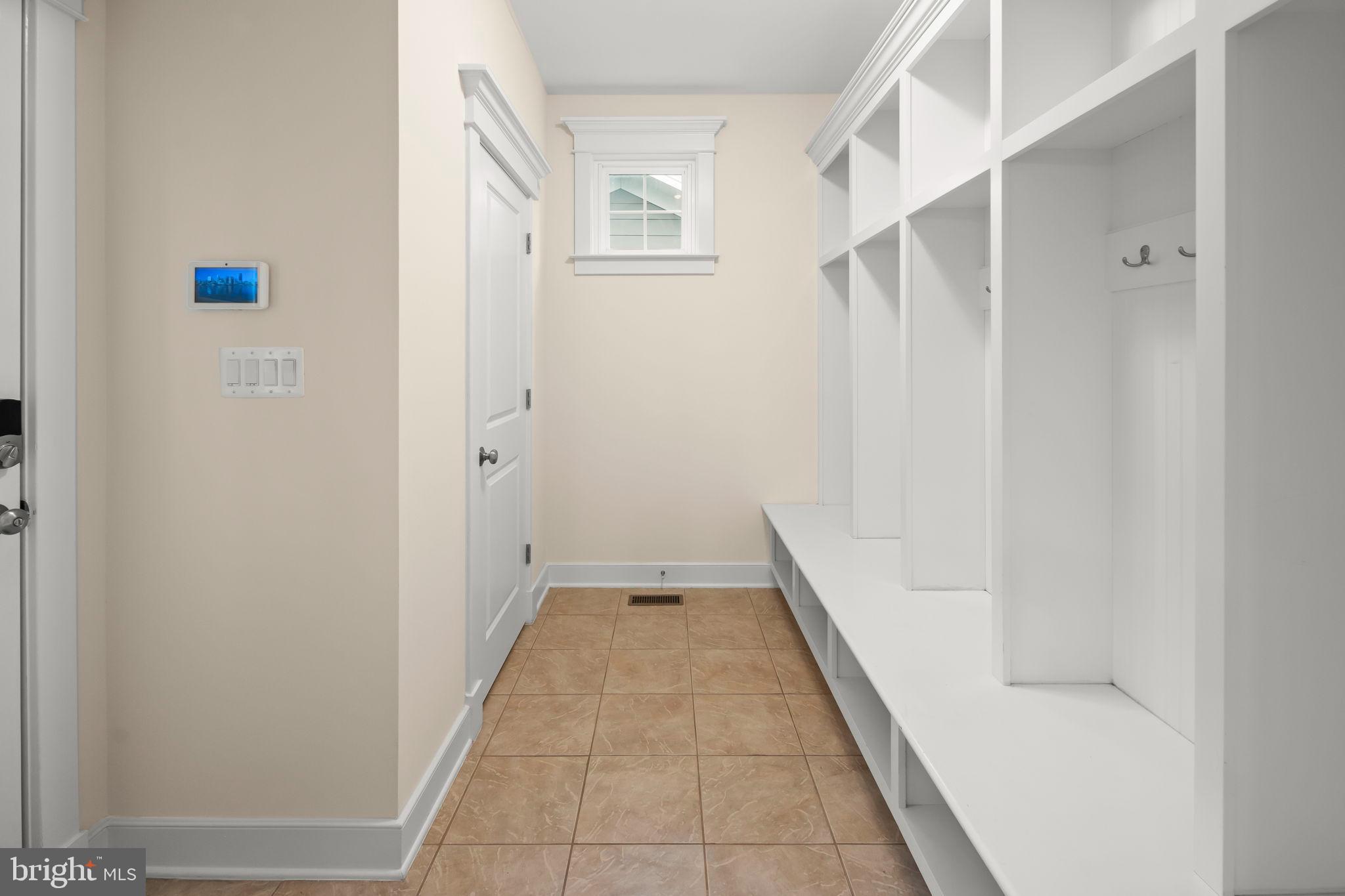 217 Pleasant Street Southwest Vienna, VA 22180 - Photo 46 of 80 Spacious and bright entryway with storage.