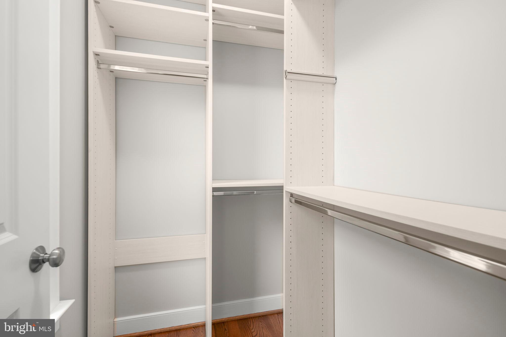 217 Pleasant Street Southwest Vienna, VA 22180 - Photo 65 of 80 Sleek, modern closet with ample storage space.