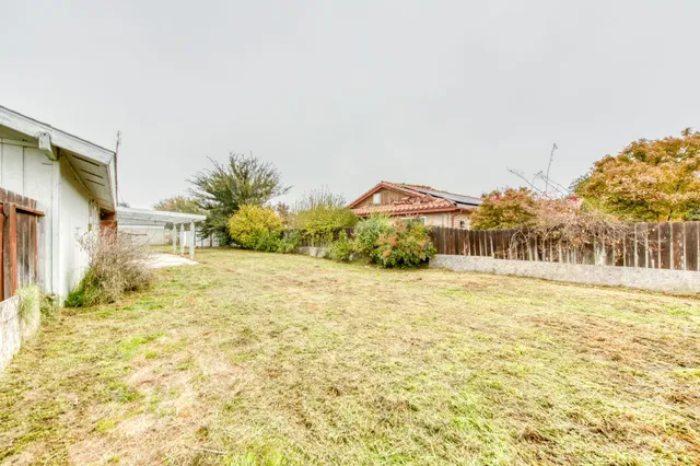 a bathroom with a sink and a yard