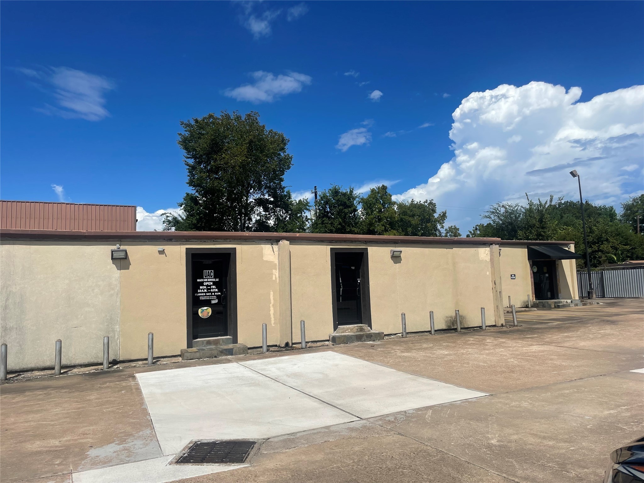14215 South Post Oak Road Houston, TX 77045 - Photo 4 of 10 a view of a house with a yard