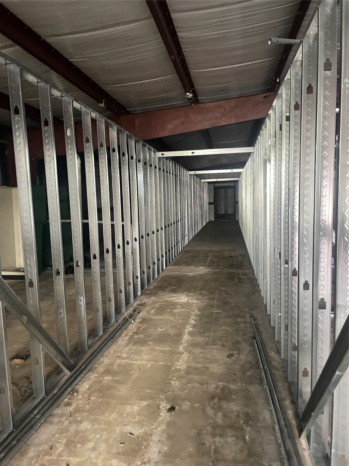 14215 South Post Oak Road Houston, TX 77045 - Photo 6 of 10 a view of a hallway with wooden floor