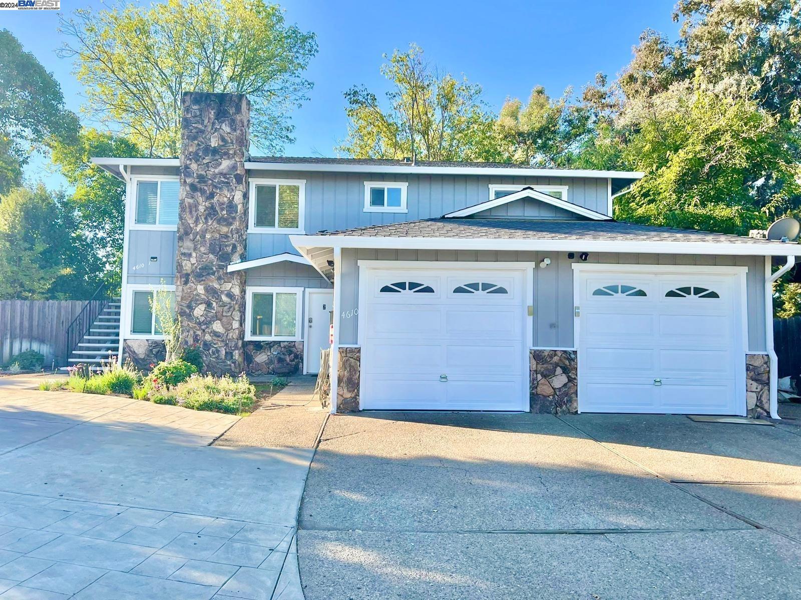 4610 West Rishell Court Concord, CA 94521 - Photo 1 of 1 a view of a house with a garage and yard