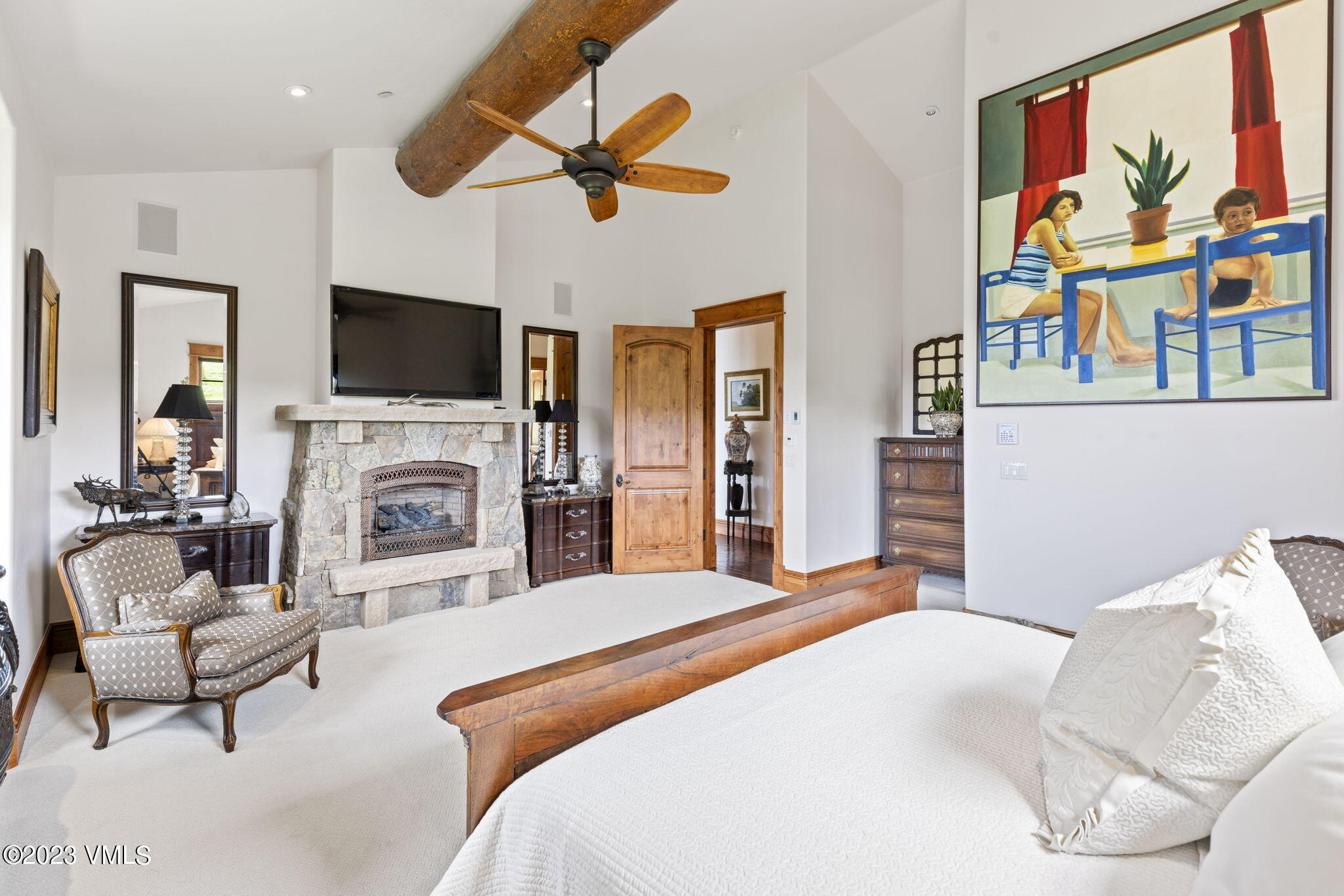 940 Summit Trail Edwards, CO 81632 - Photo 22 of 64 a bedroom with a bed and a flat screen tv