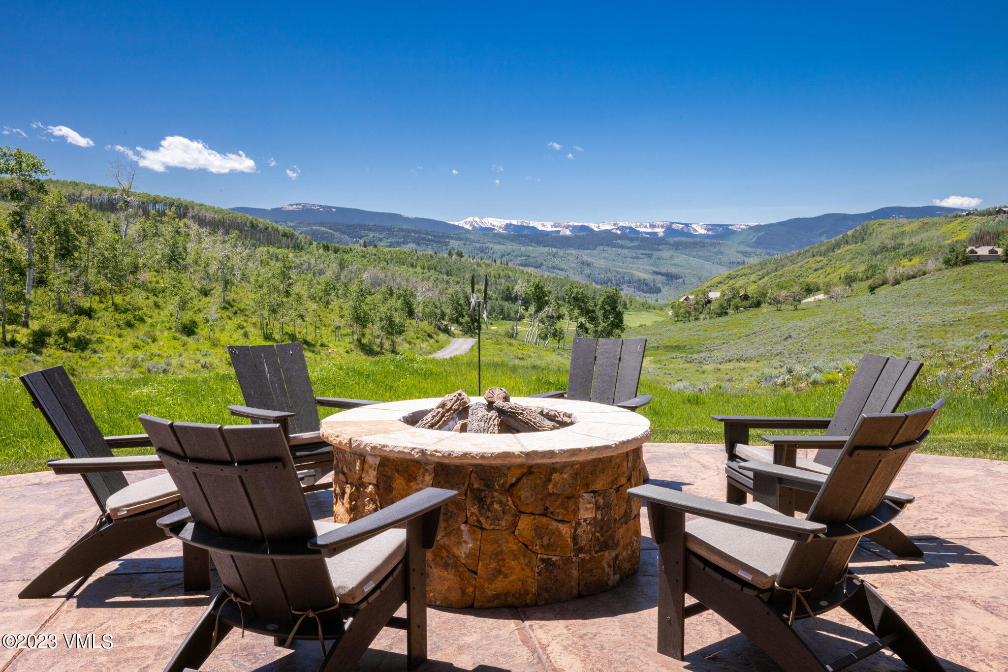 940 Summit Trail Edwards, CO 81632 - Photo 27 of 64 a view of a patio with a dining table and chairs