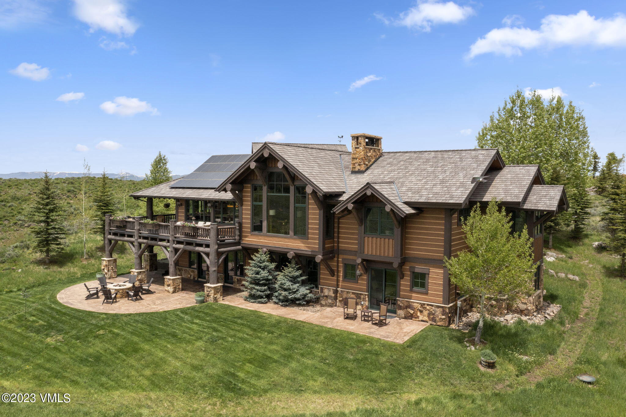 940 Summit Trail Edwards, CO 81632 - Photo 3 of 64 a view of a house with swimming pool and sitting area