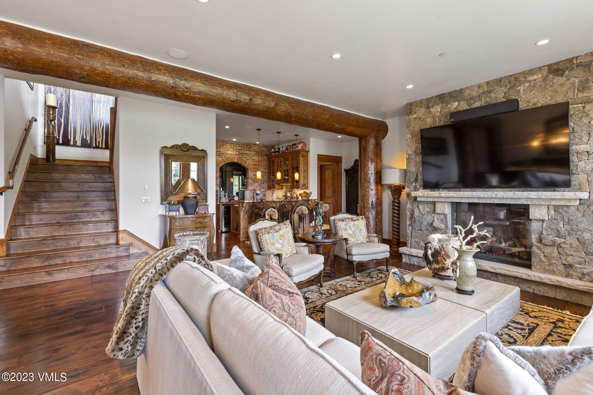 940 Summit Trail Edwards, CO 81632 - Photo 32 of 64 a living room with furniture and a flat screen tv