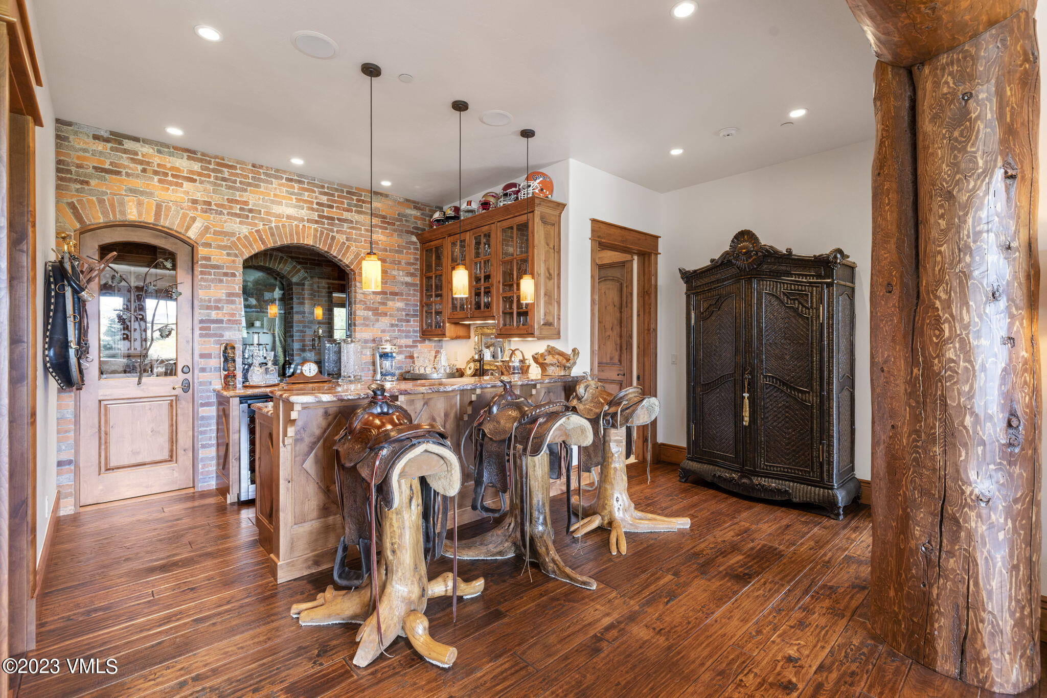 940 Summit Trail Edwards, CO 81632 - Photo 33 of 64 a view of a dining room with furniture window and wooden floor