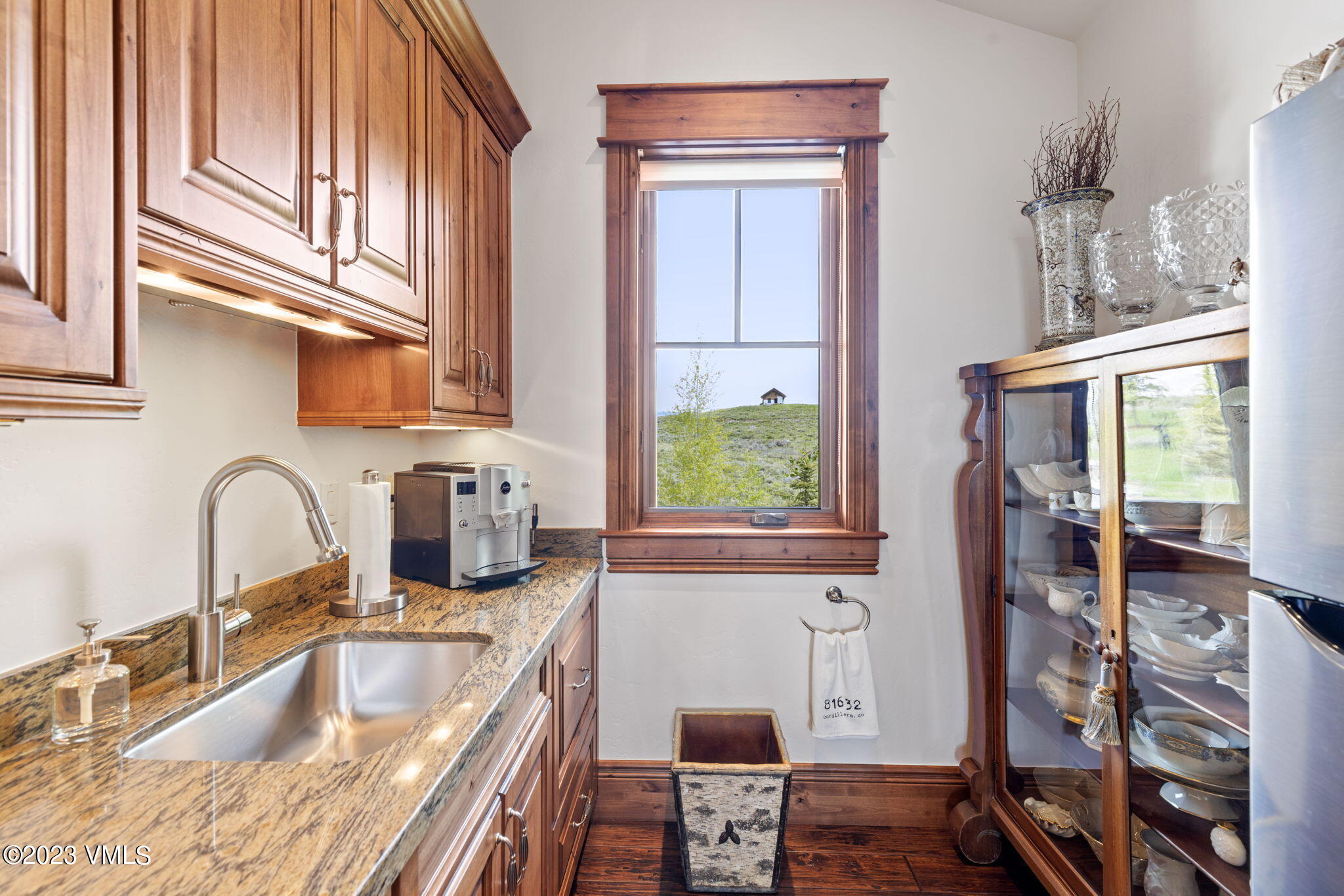 940 Summit Trail Edwards, CO 81632 - Photo 50 of 64 a kitchen with granite countertop a sink and a window