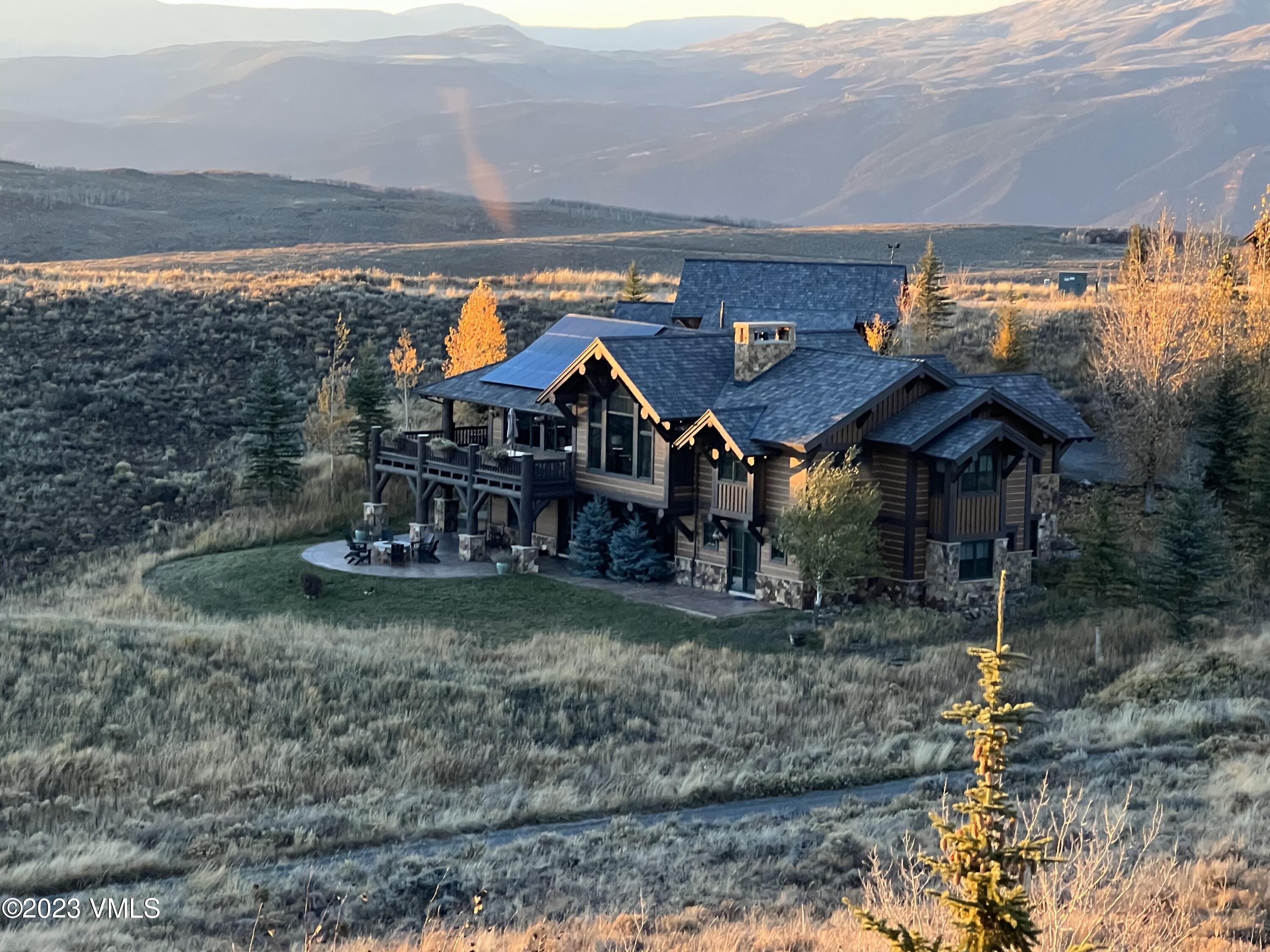 940 Summit Trail Edwards, CO 81632 - Photo 57 of 64 a view of a house with a yard and sitting area