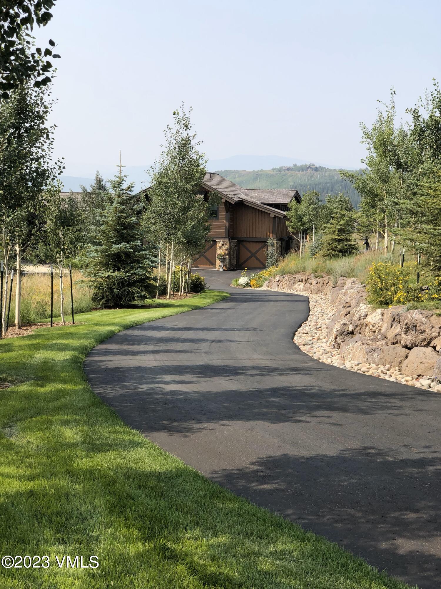 940 Summit Trail Edwards, CO 81632 - Photo 61 of 64 a view of yard with swimming pool and green space