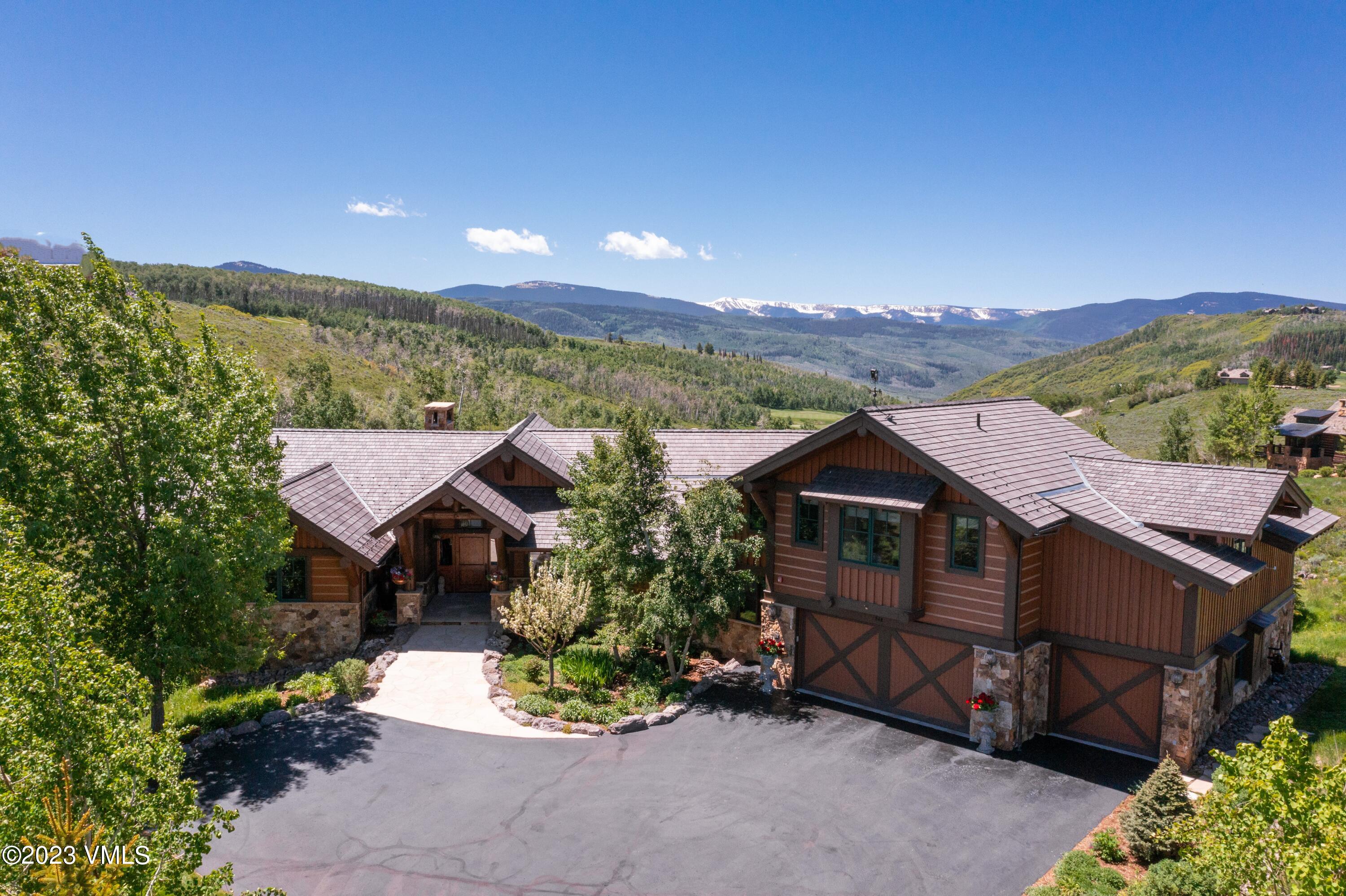 940 Summit Trail Edwards, CO 81632 - Photo 64 of 64 a front view of a house with a yard