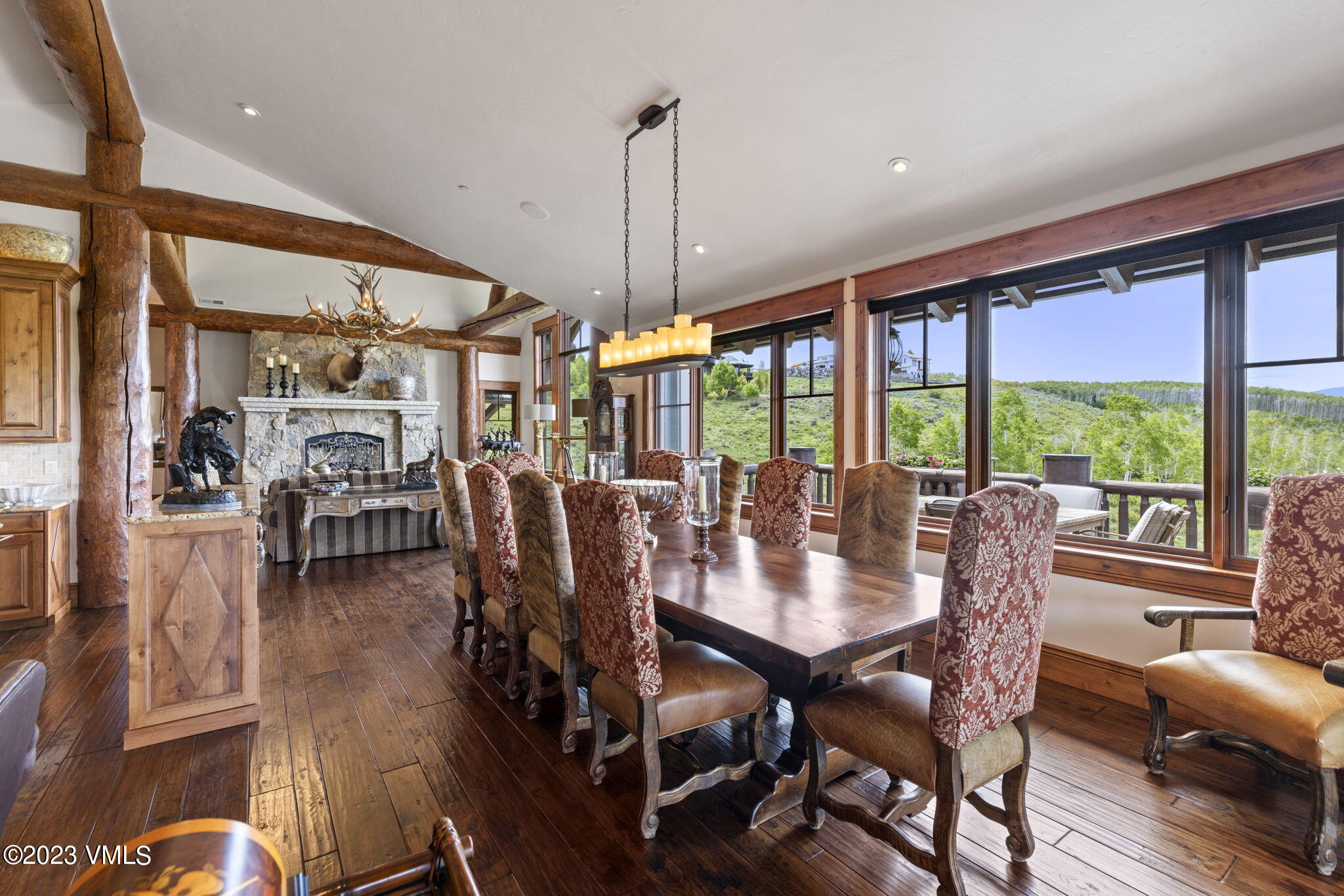 940 Summit Trail Edwards, CO 81632 - Photo 10 of 64 a view of a dining room with furniture window and wooden floor