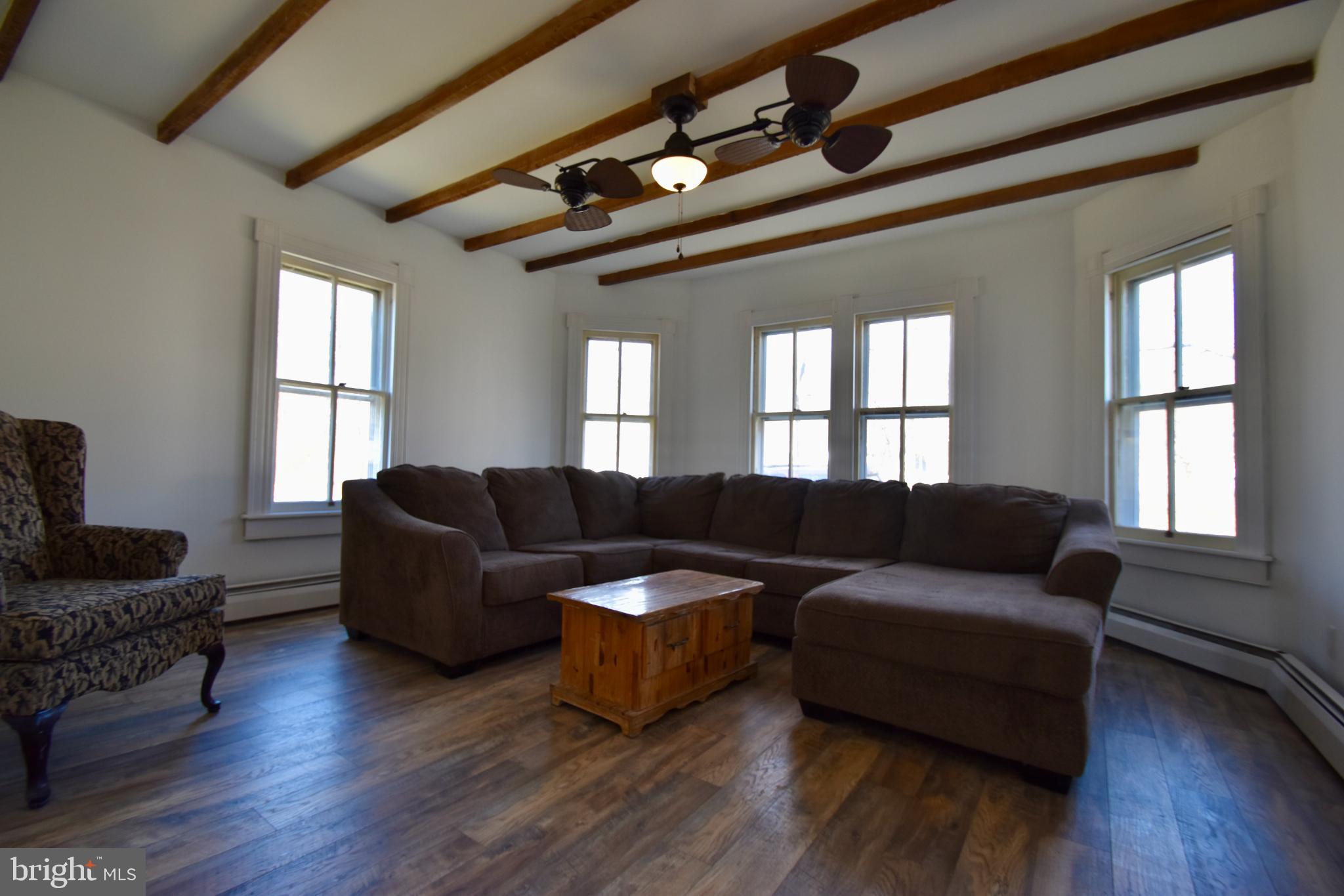115 Maple Avenue Goldsboro, MD 21636 - Photo 3 of 15 Spacious living area with natural light.