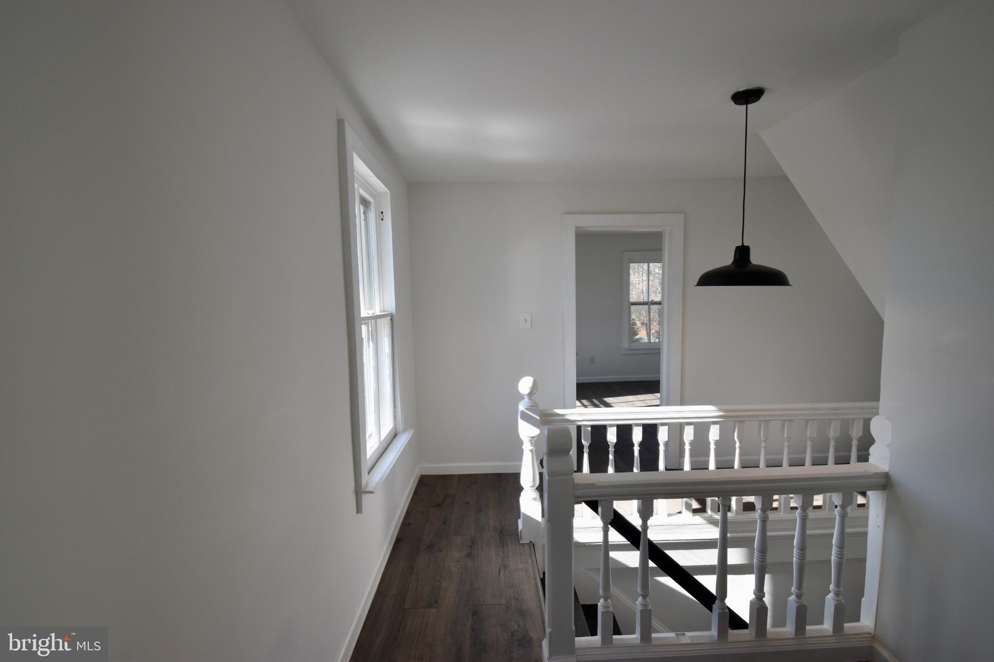 115 Maple Avenue Goldsboro, MD 21636 - Photo 7 of 15 Bright and airy staircase with modern charm.