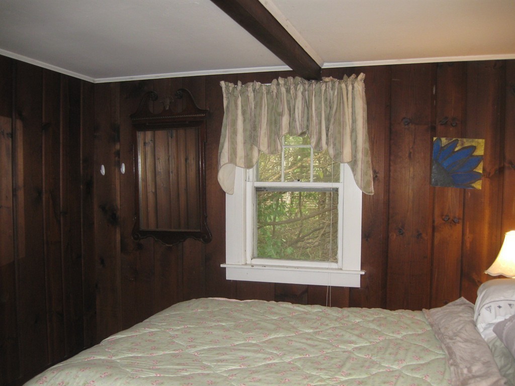 70 Depot Road West Harwich, MA 02671 - Photo 10 of 25 a bedroom with a bed and a window