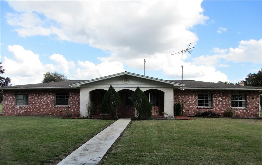 2421 McIntosh Road Dover, FL 33527 - Photo 1 of 1 EXTERIOR FRONT VIEW