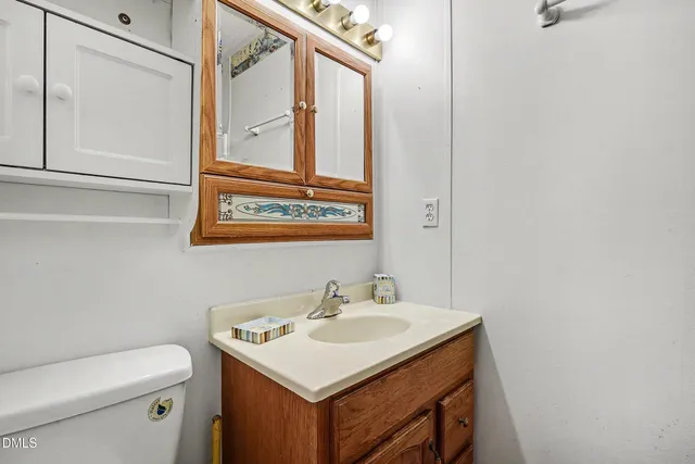 an empty room with a flat screen tv