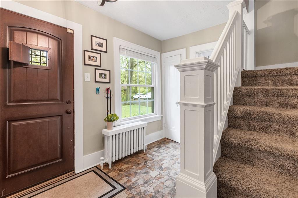 305 7th Street Beaver Falls, PA 15010 - Photo 13 of 37 a view of entryway with wooden floor and stairs
